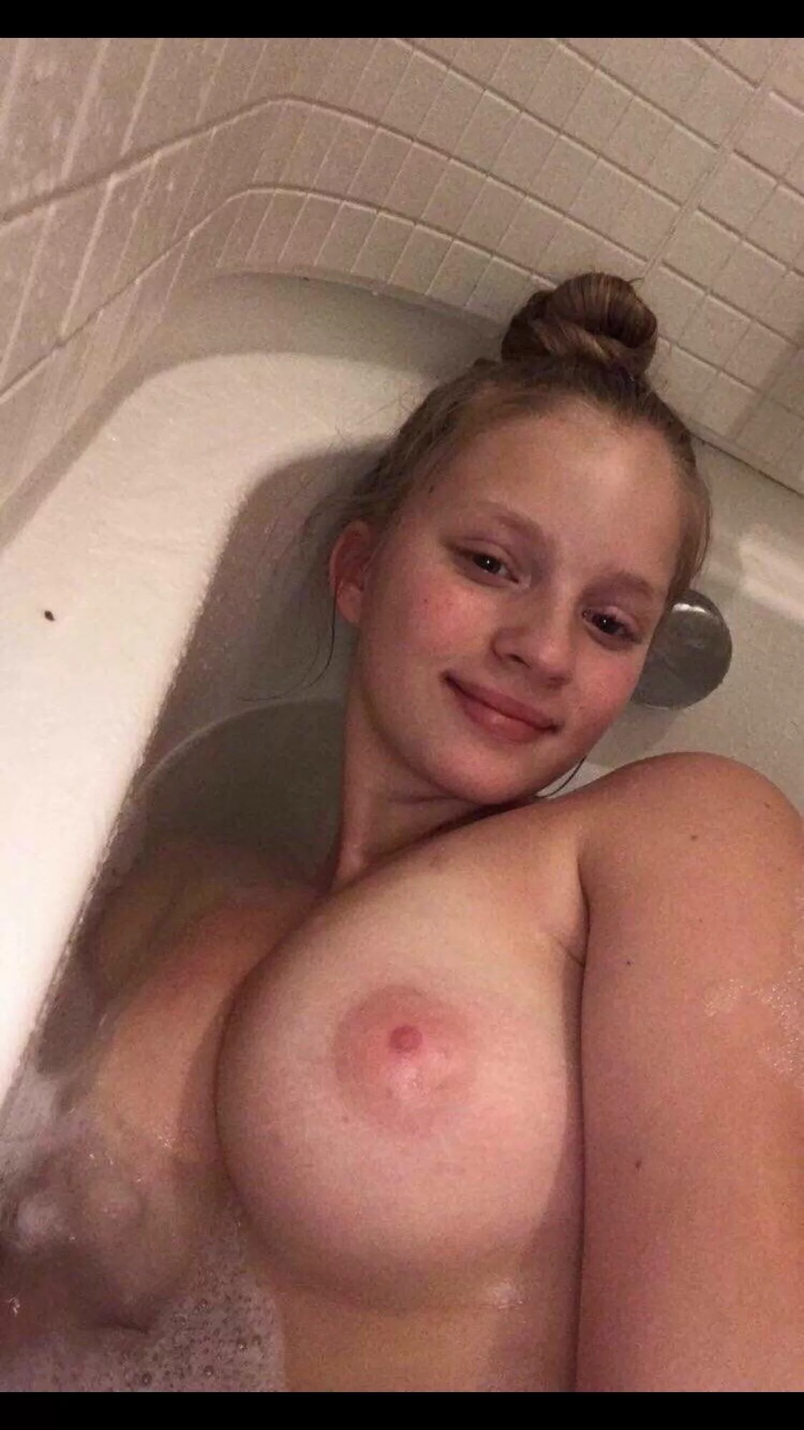 in the bathtub posted by RemarkableParking326