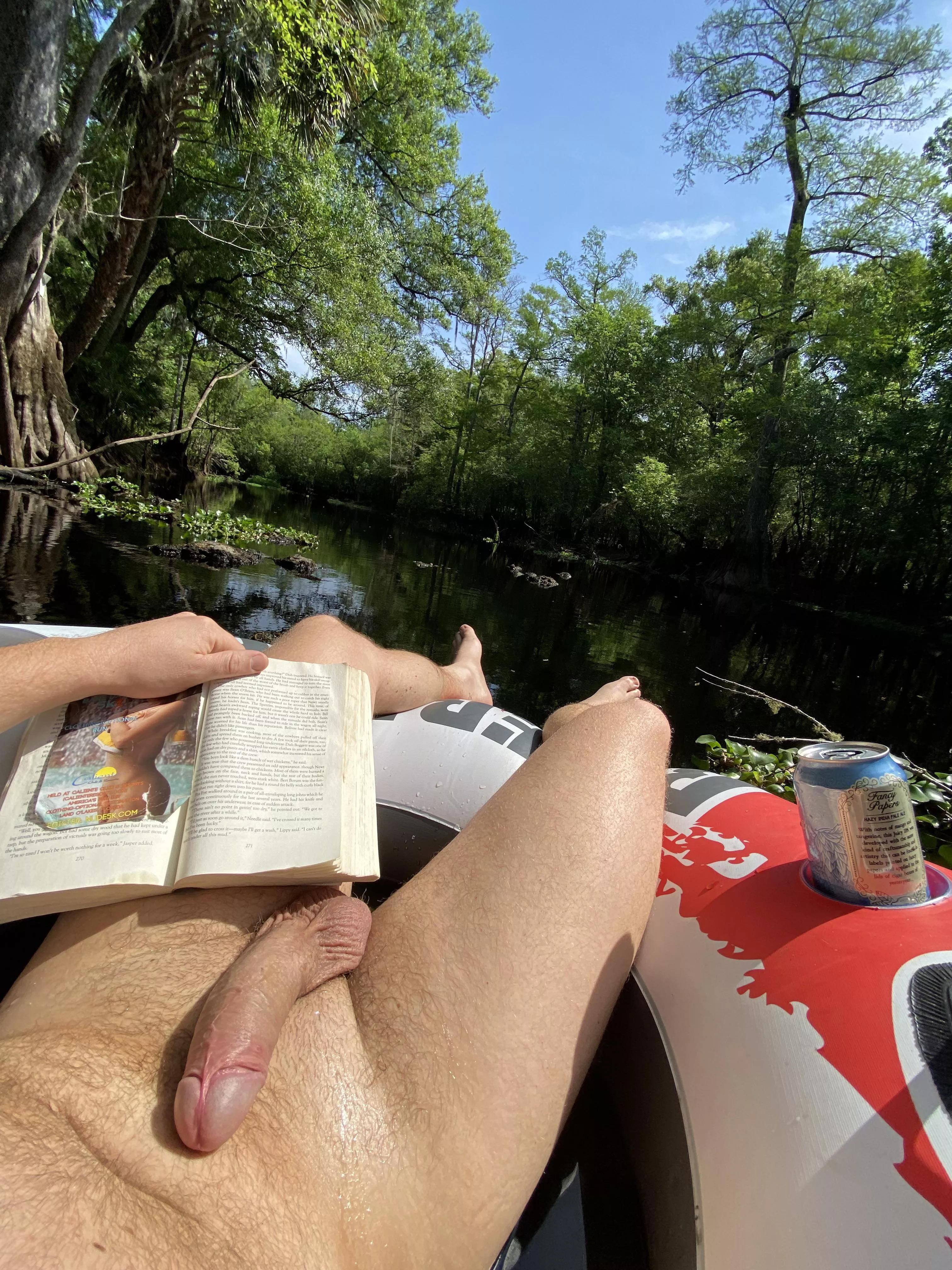 Books are a must on a lazy river day posted by nakedwildman1