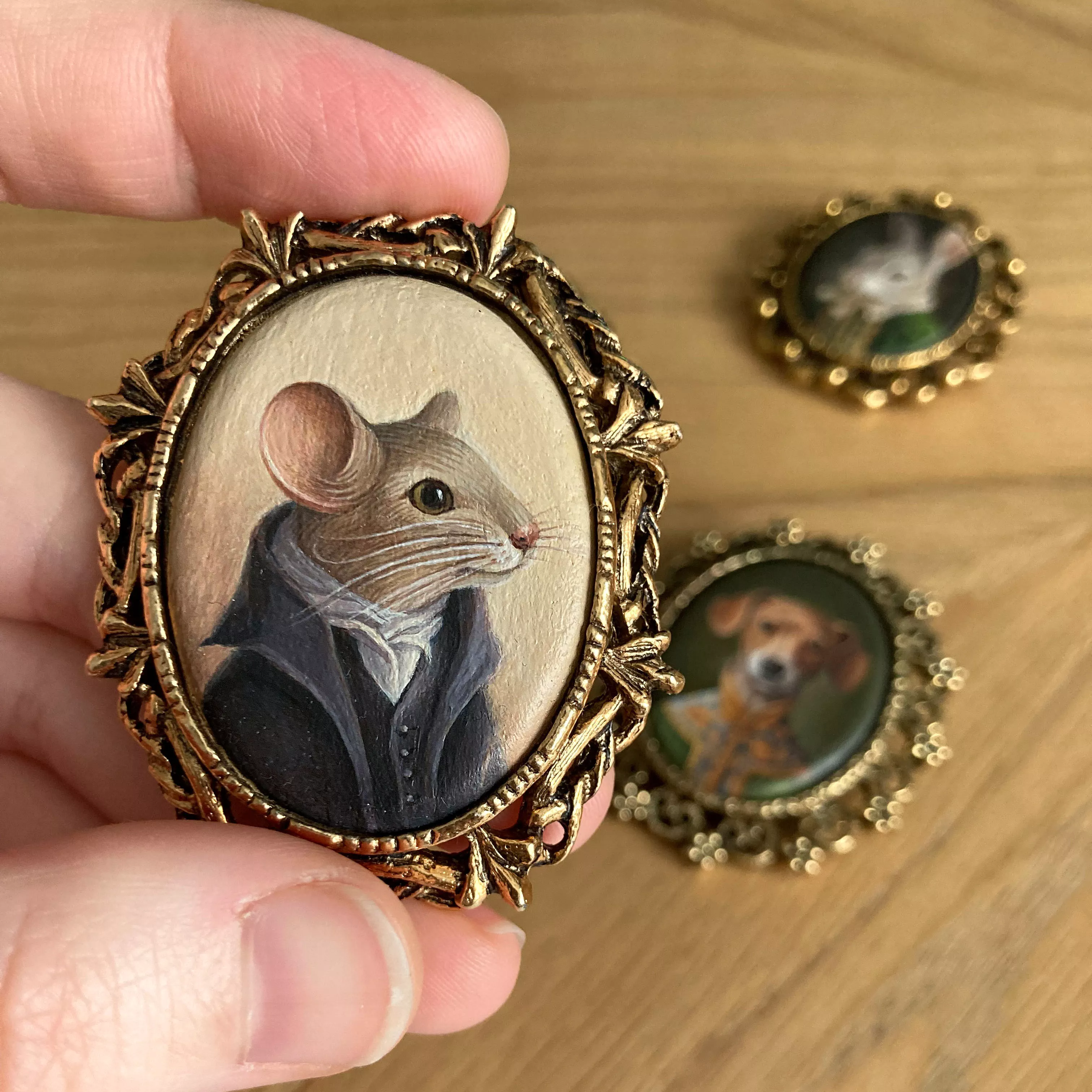 Christopher Maus, hand painted brooch (or miniature painting) posted by foxyandpaper