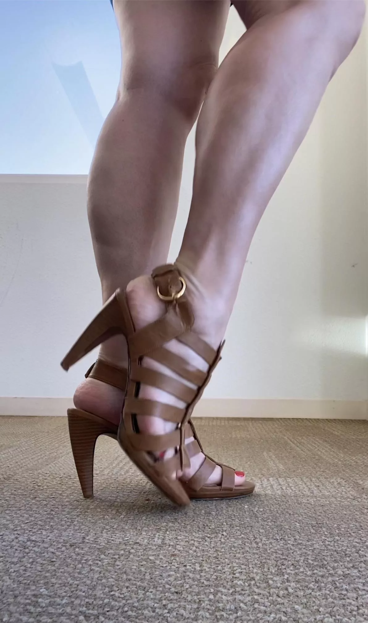 Strappy brown heels. Never underestimate the power of a great shoe and it’s ability to change your mood. posted by Aishadahava