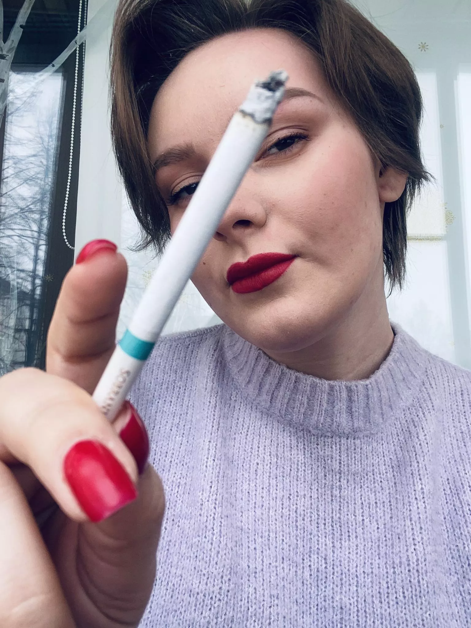 Close up with that cigarette posted by Mistress_Di