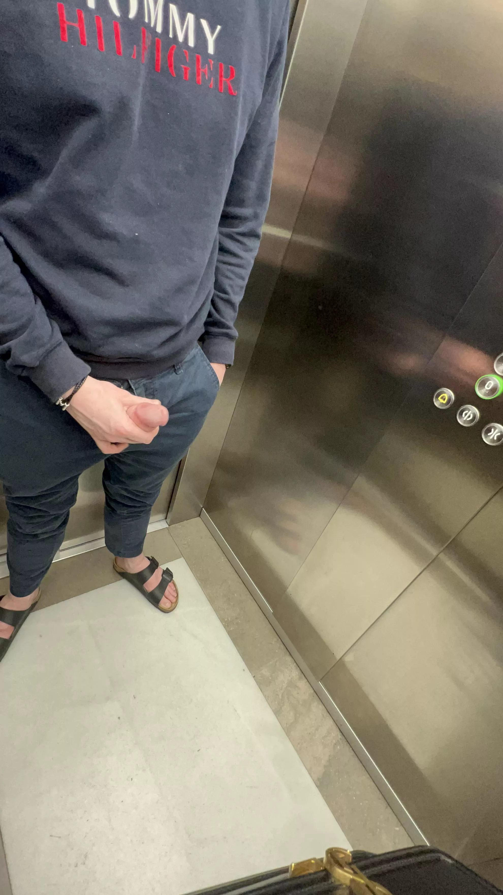 In the elevator - again posted by FootFetishExhib