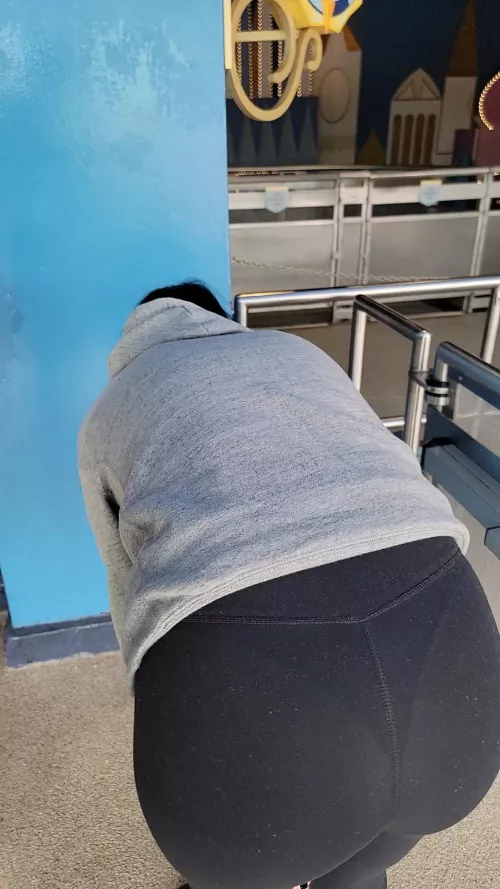 Stretching in line at It's a Small World! by bootyfull_britt