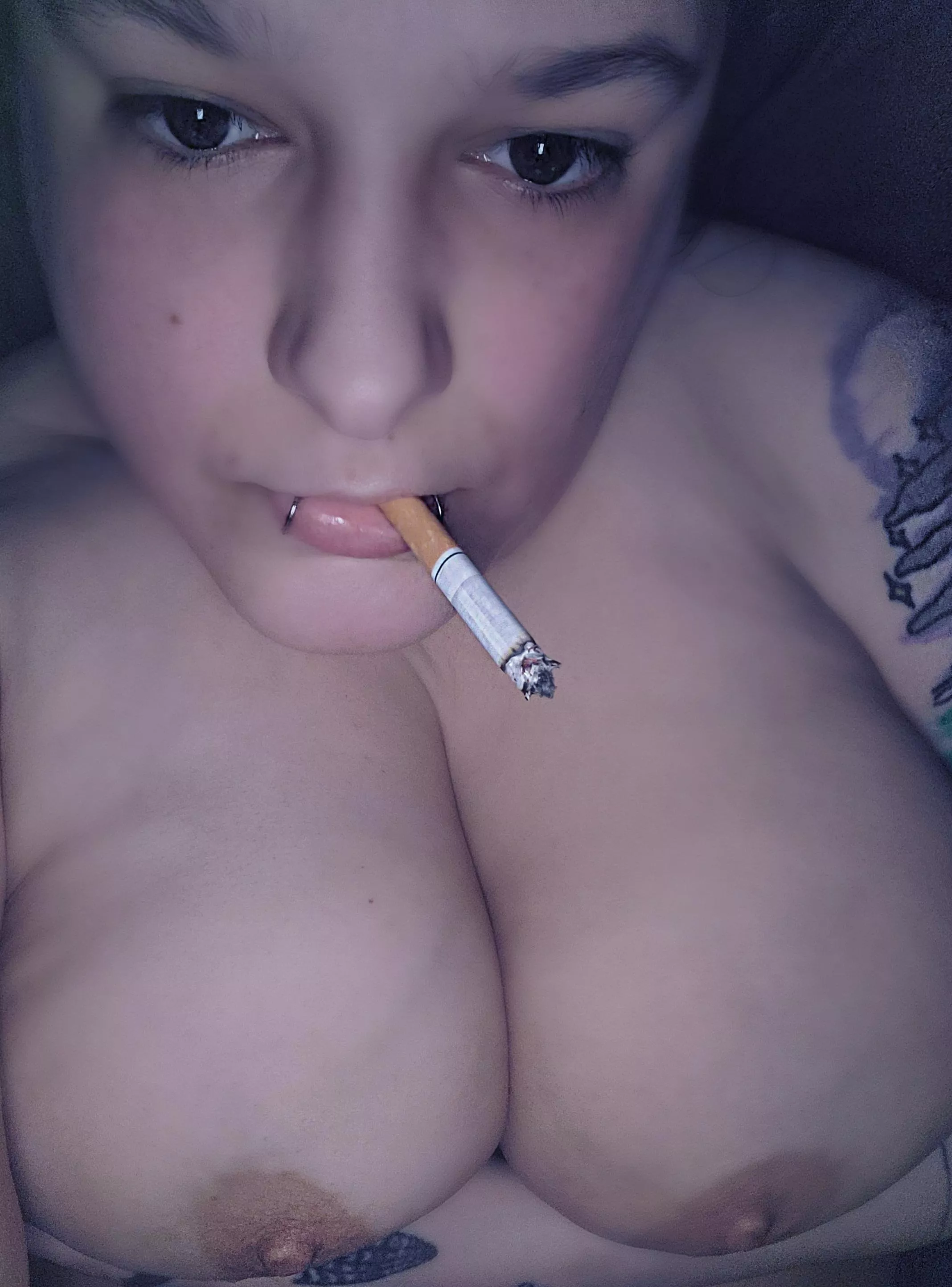 Tits and cigarettes 🖤🚬 posted by DrellaLuna34