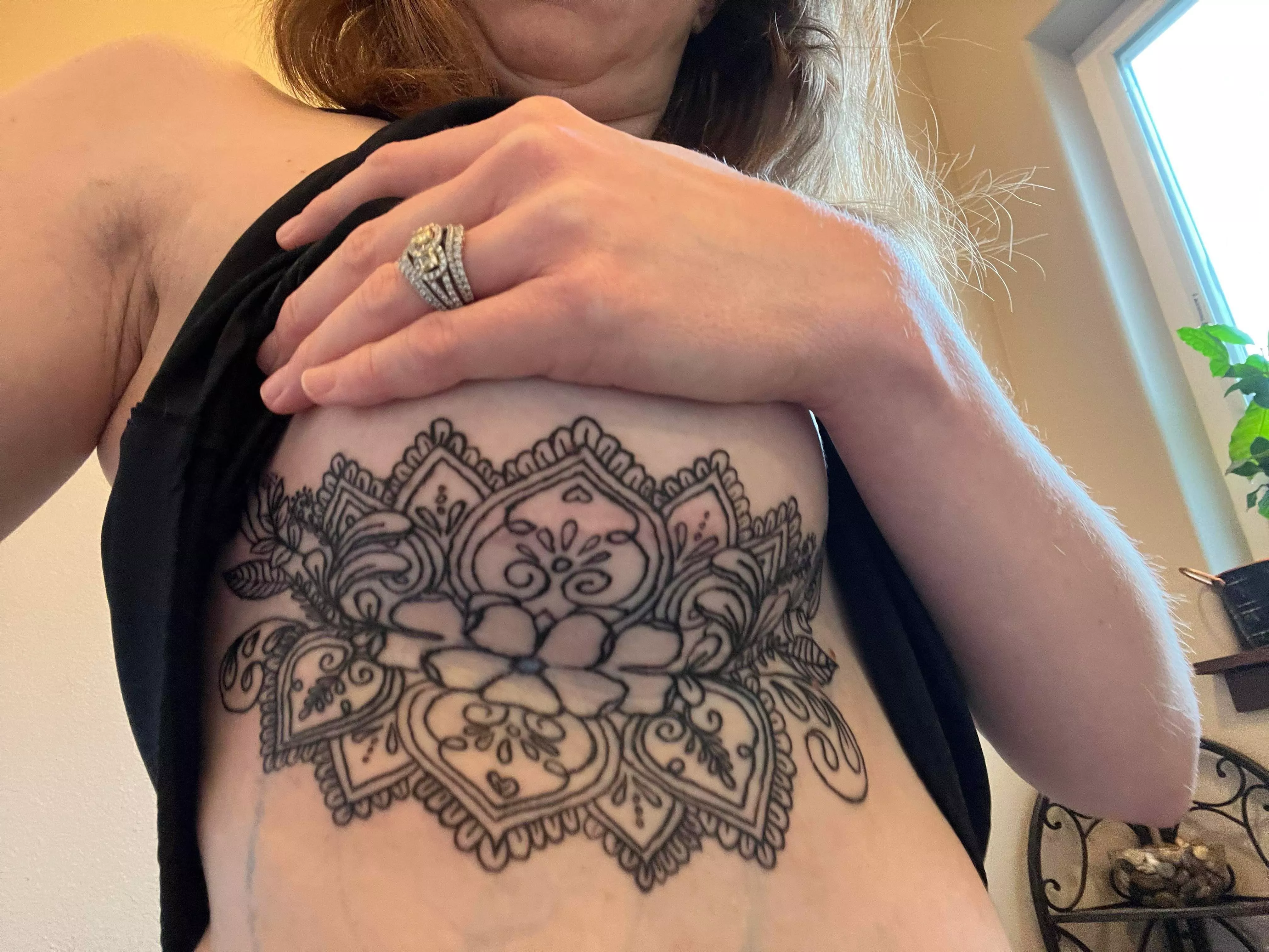 My wife’s first tattoo done by idoyatts in the PNW! She got it to cover up her implant scar and will add the other side in a week or so! Let us know what you think about her posted by Wannalaw18
