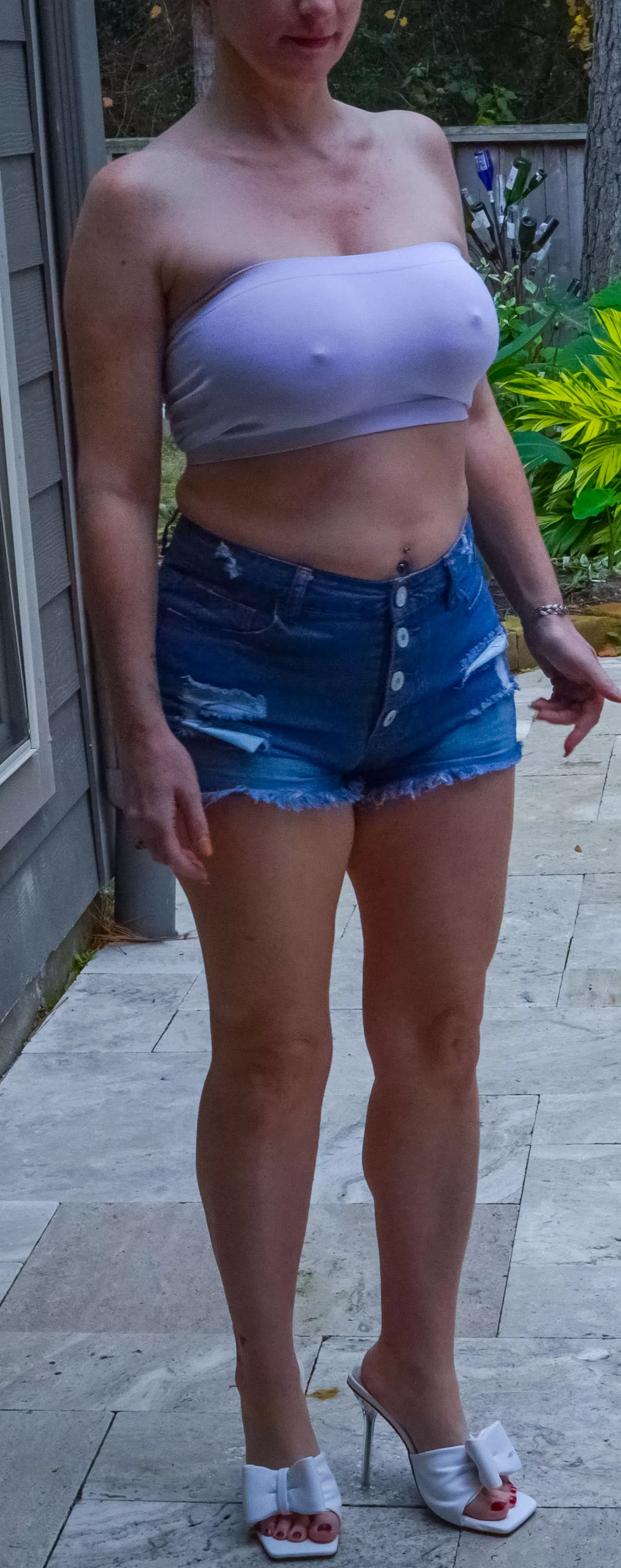 Can't get much hotter than daisy dukes, tube top and heels posted by MrsRobynsin