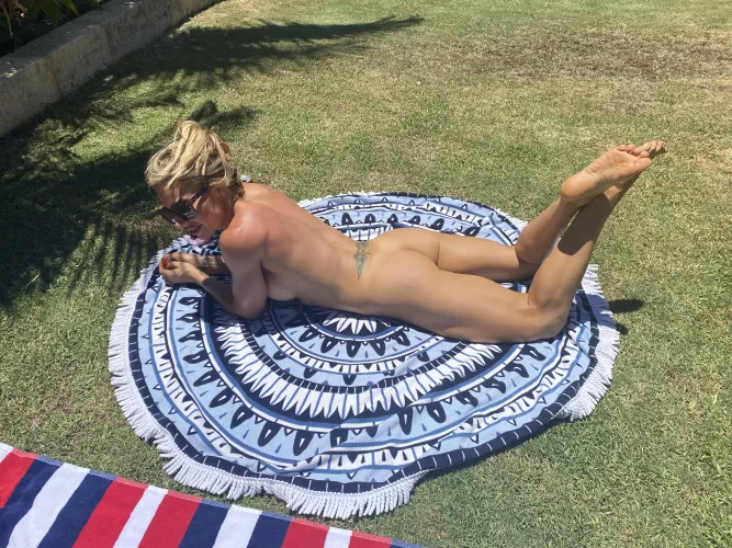 Getting my beach tan on by hothornyhoney