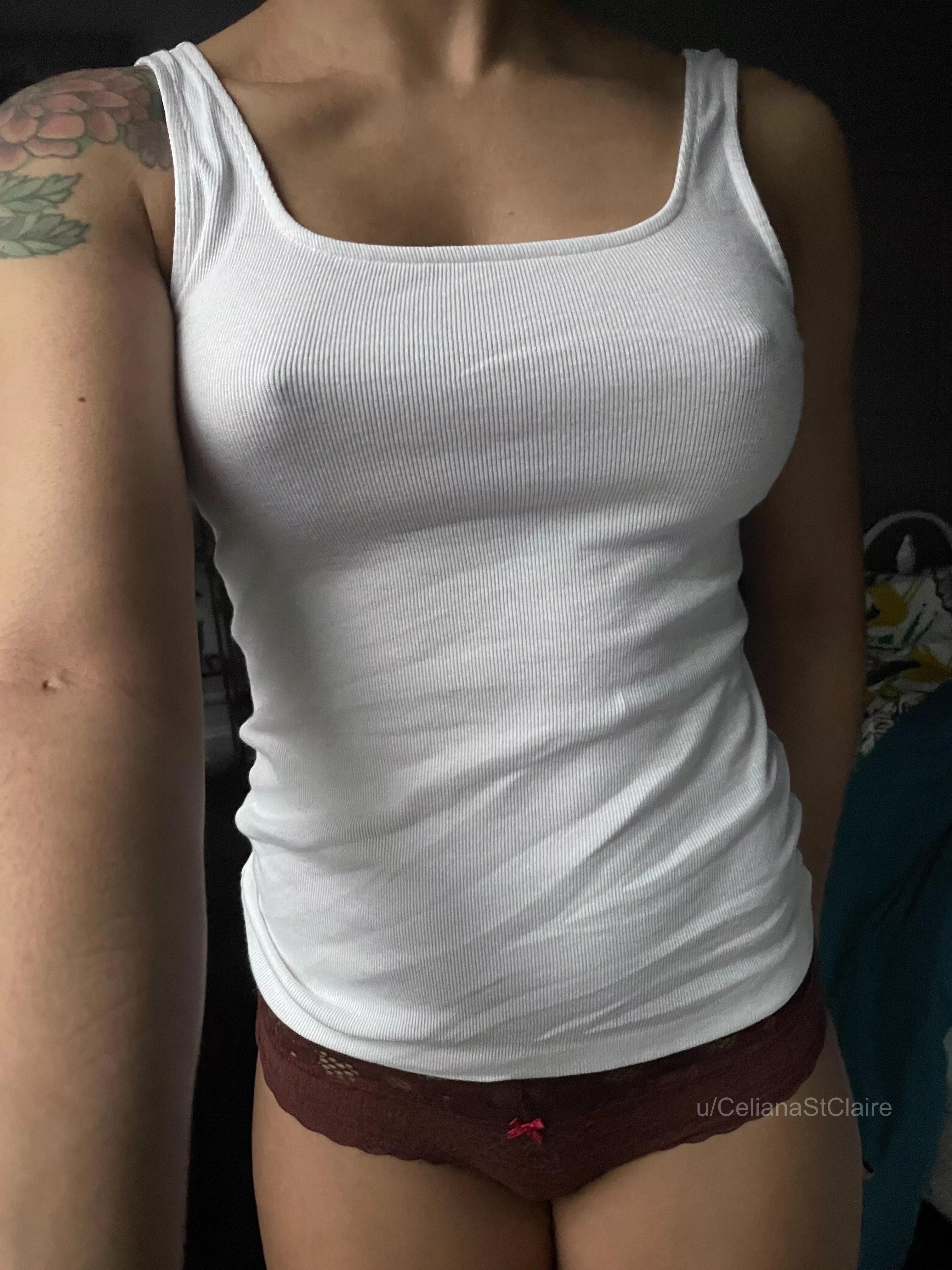 I think I can make a plain white tank look cute posted by CelianaStClaire