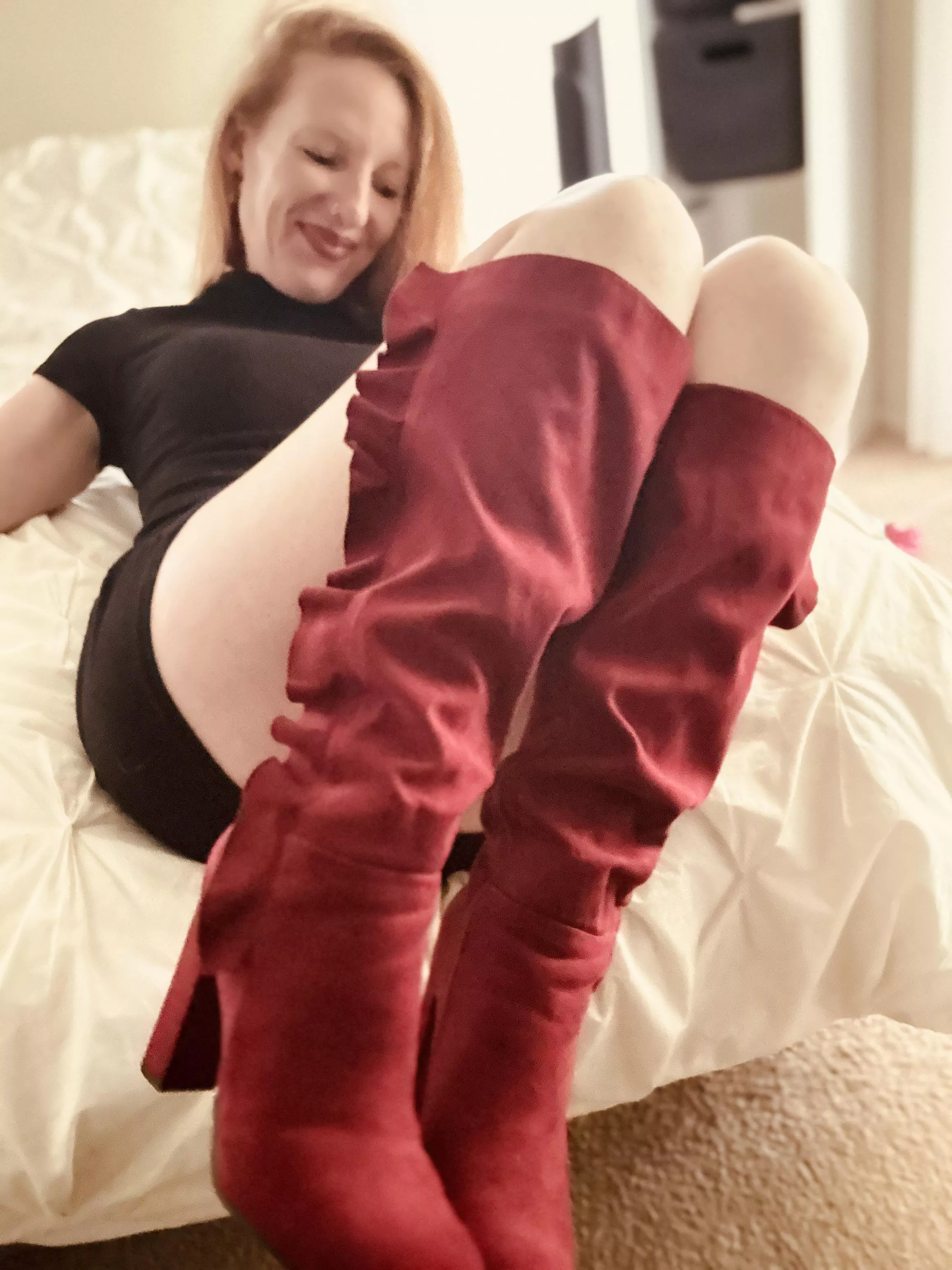 Red boots and a little black dress posted by RedAfricanButterfly