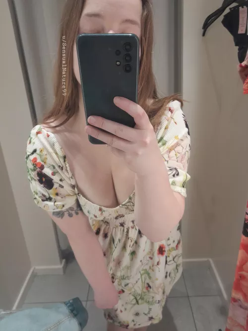 The cleavage makes the dress even cuter by SensualNature99