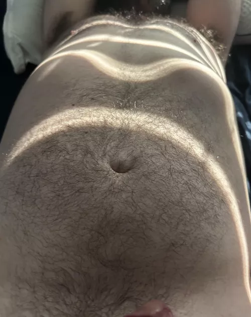 My hubs hairy chest in the sun. by xr4tiboi