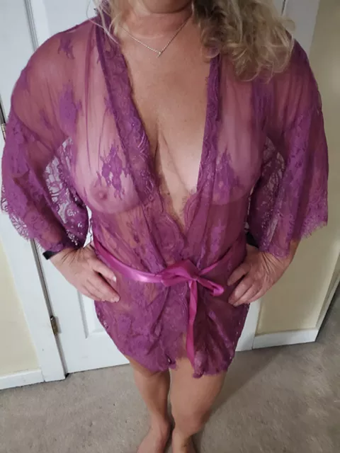 This Milf looks good in purple, but prefer it taken off by a hot hung guy... posted by wyckedjasmine