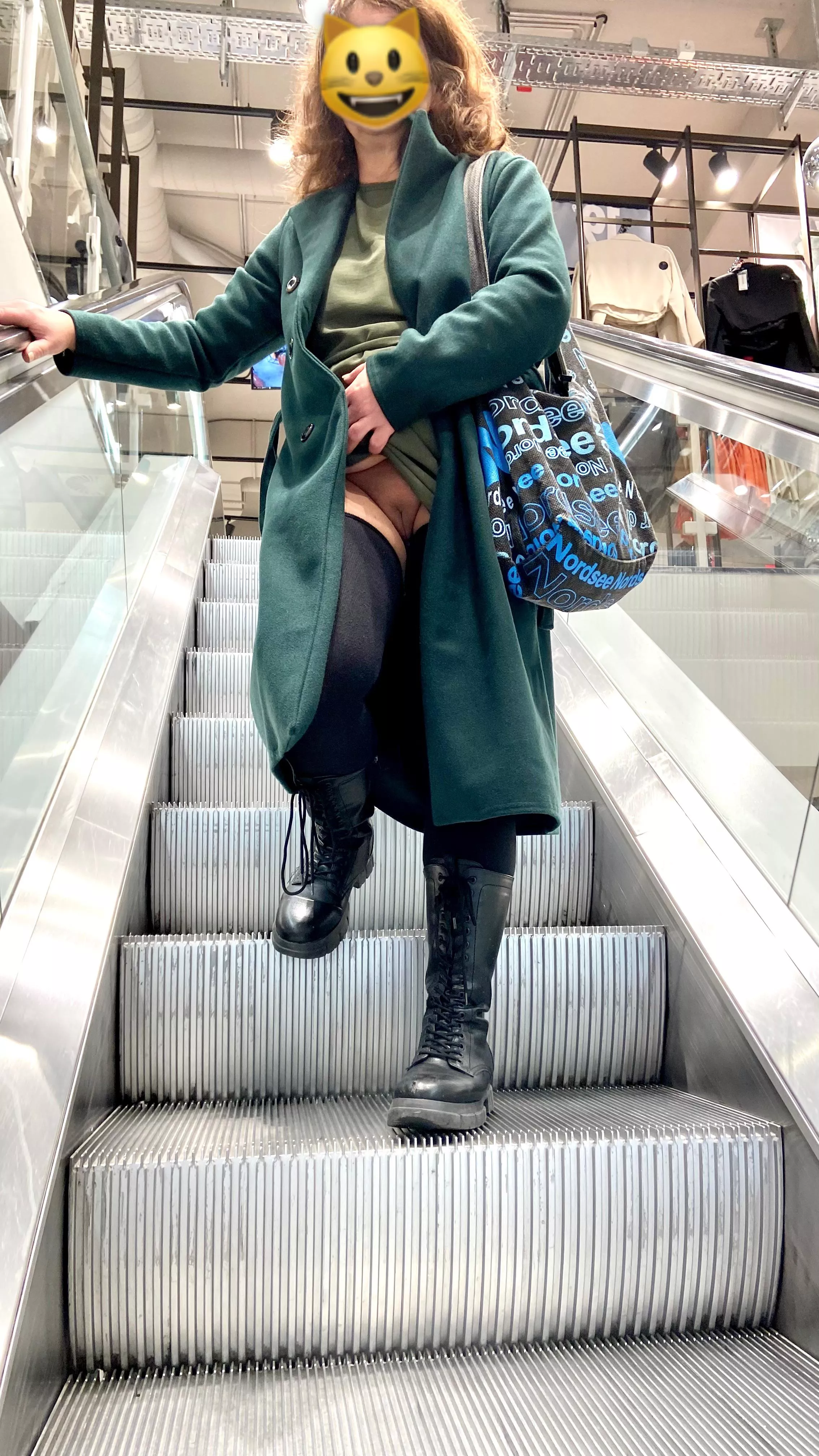 (f)went down escalator. oops, what is there to see? posted by seeallifyouwant