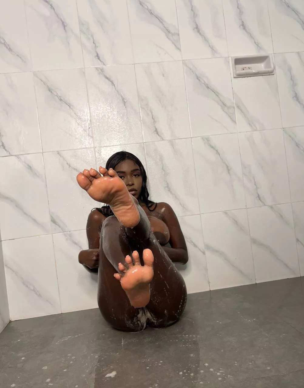 would you lick my feet? posted by naughtyblackangel