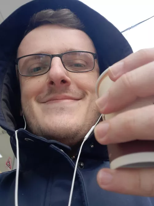 I took this picture of me this morning, right after getting my coffee. on my way to my new job, a job that has been my dream ever since college. I am finally a Technical Writer. by hollowreader