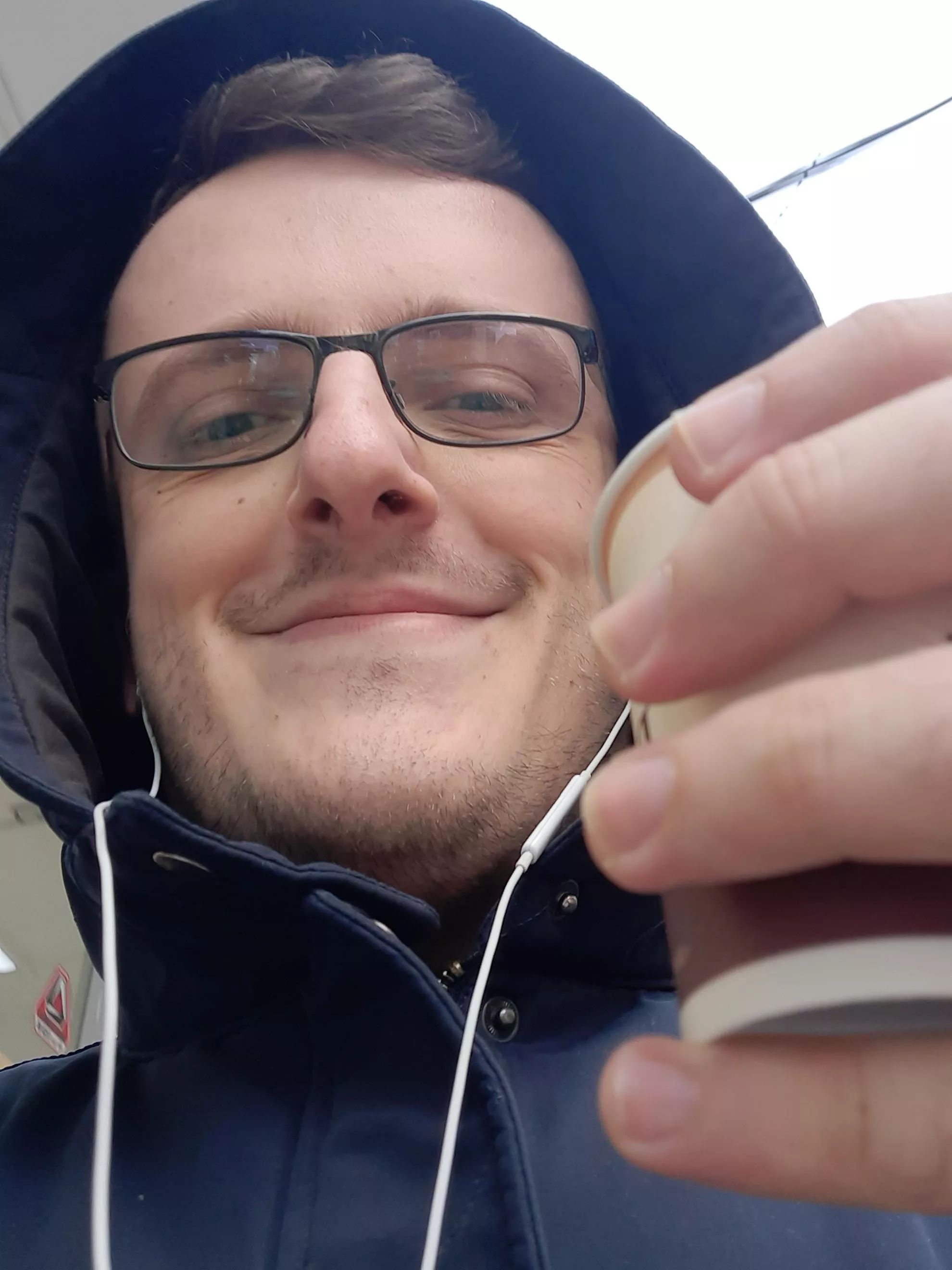 I took this picture of me this morning, right after getting my coffee. on my way to my new job, a job that has been my dream ever since college. I am finally a Technical Writer. posted by hollowreader