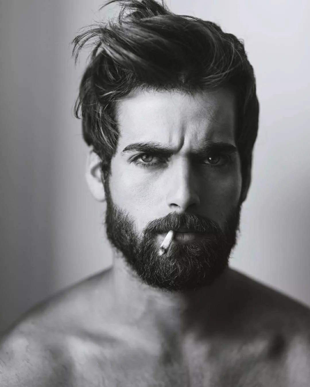 Headshot taken from a friend's studio. I don't smoke. Those are herbal cigarettes flavoured 