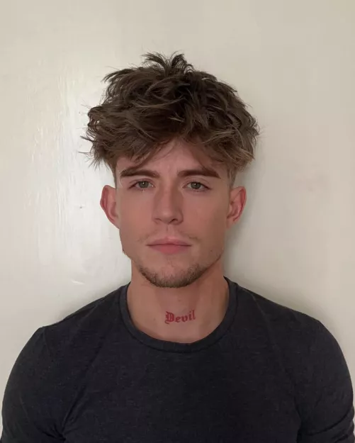 Is my passport photo okay? People say the tattoo ruins it, idk, i have more tattoos of course but just picture wise do i look silly :/? by theofdevil