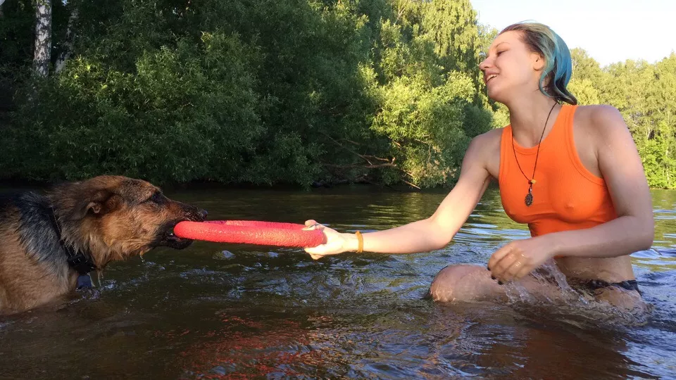 Playing with the dog in last summer posted by HORUSHERESY12