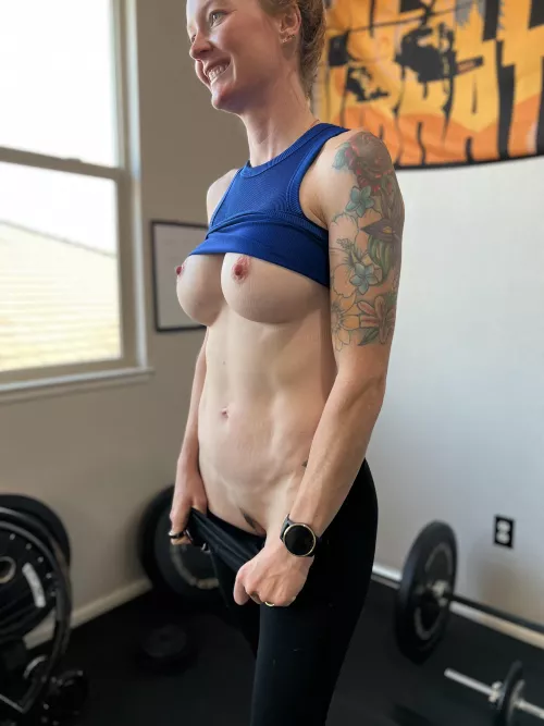 In my gym trying to stay fit enough to fit in here. by fitredheadd