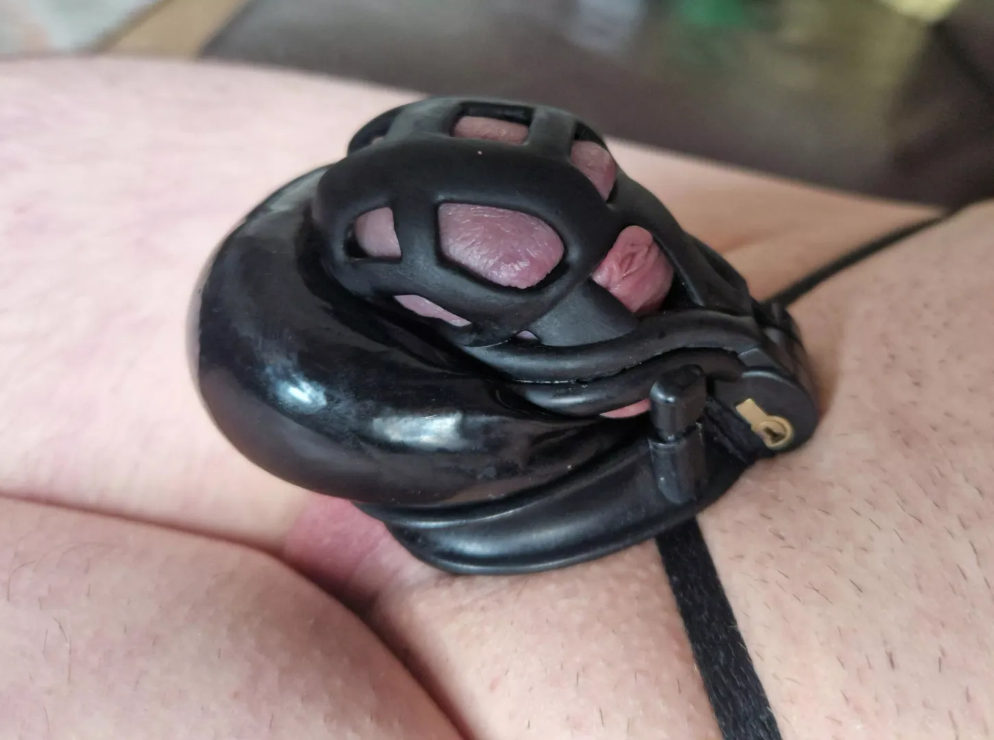 Shiny locked clitty and balls posted by Ok-Fee1573