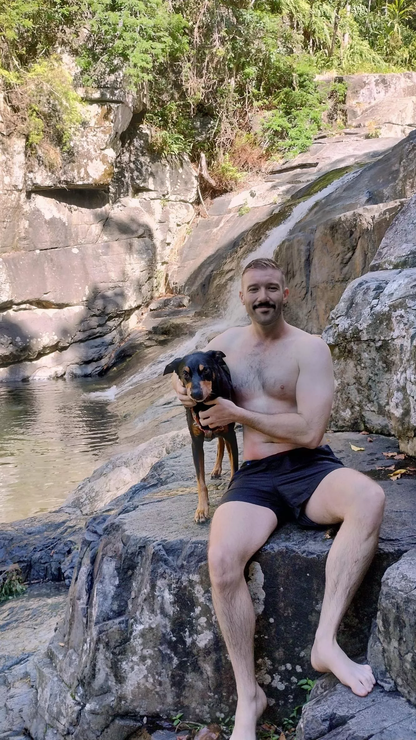 Waterfall and a dog posted by Turnedmilkins