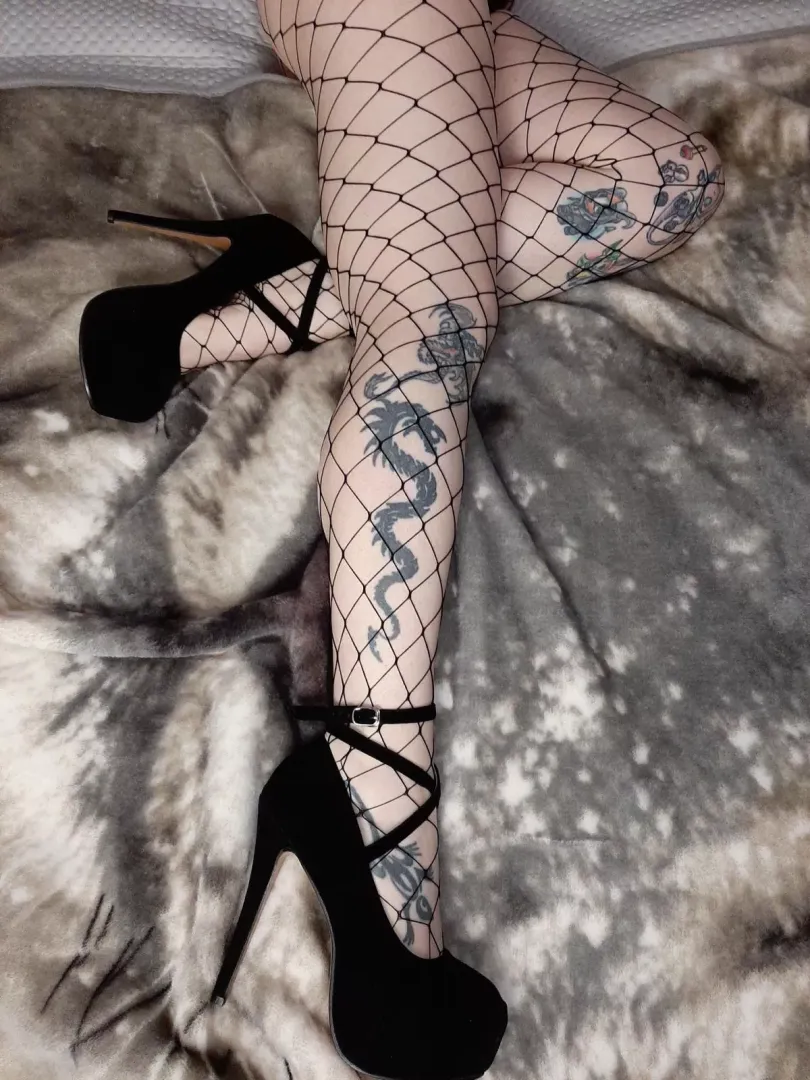 In my favourite fishnets! They don't cover much hehe posted by OneObsidianKitten