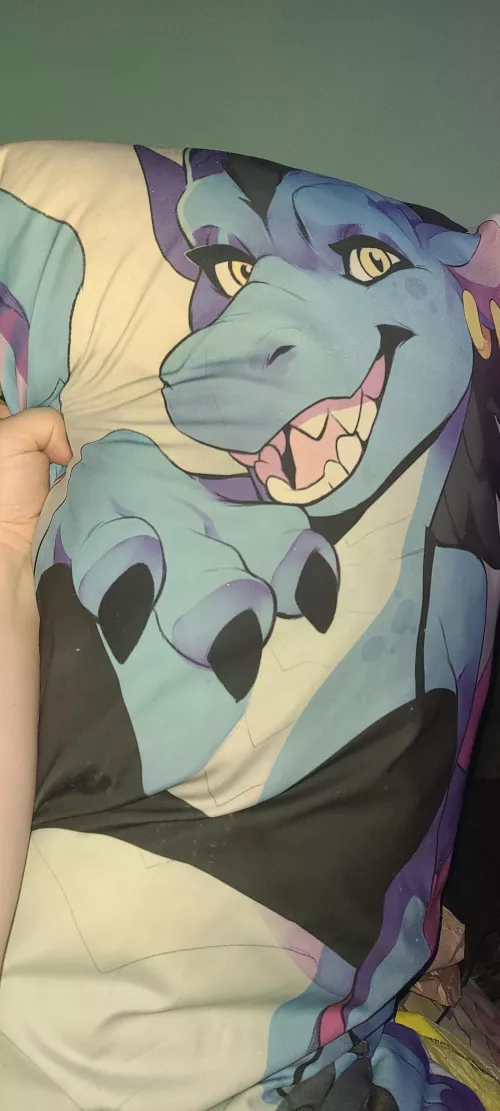 A friend sent me this image and I would like to know what body pillow this is. Link to it on website or original art is what I'm looking for by Iggi_Gaming_offi