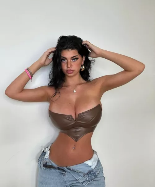 In a tiny crop top by Consistent-Focus-914