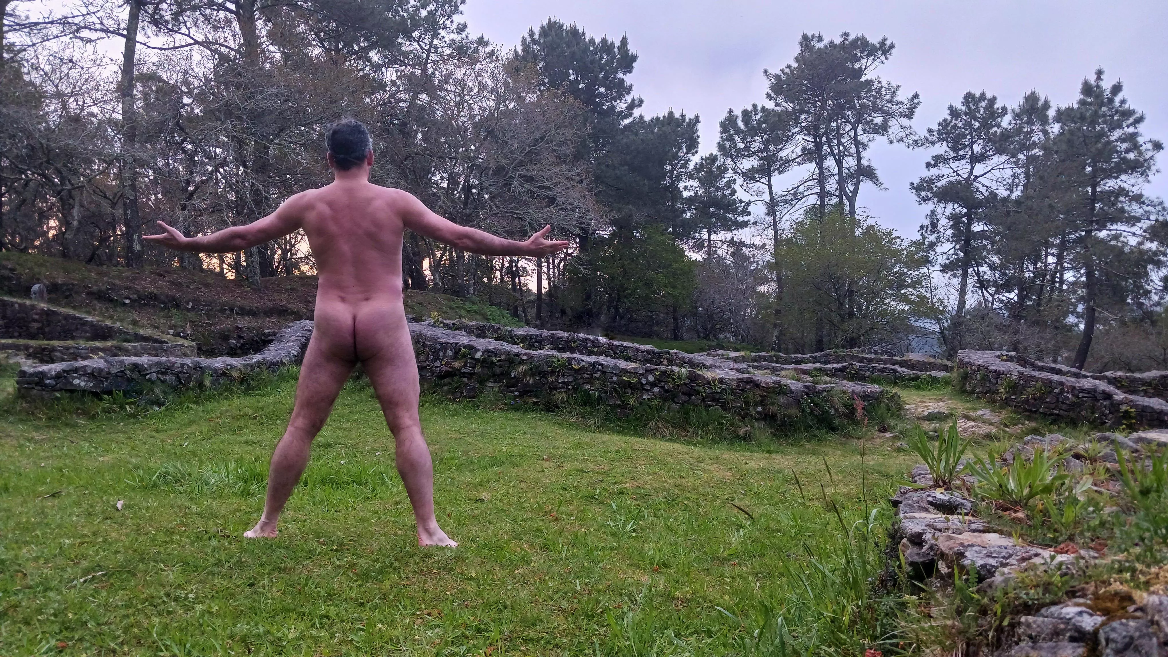 Hiking in a prehistoric village posted by nudebodytime