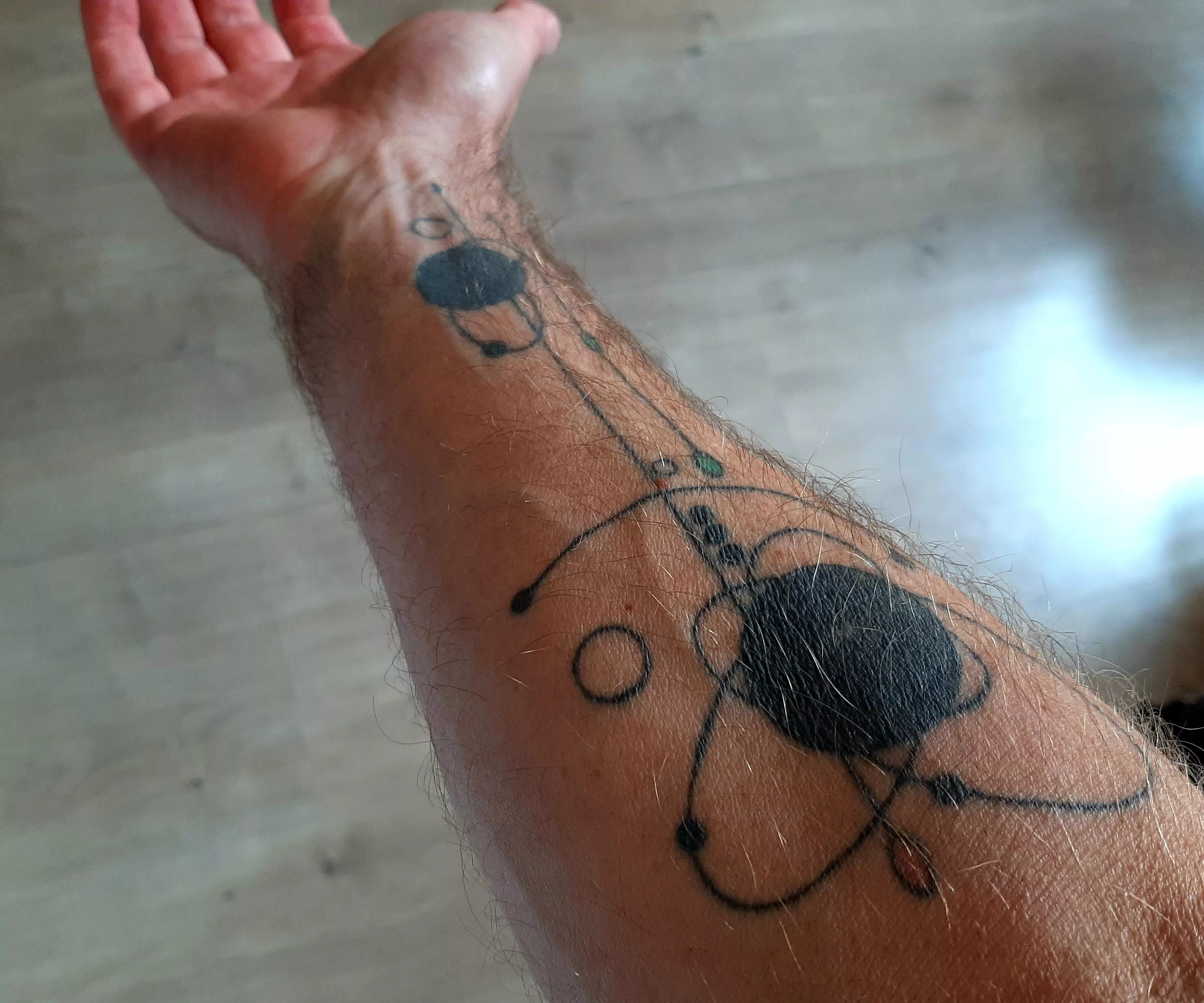 My forearm with self-designed tattoo. posted by WellAgedAussie