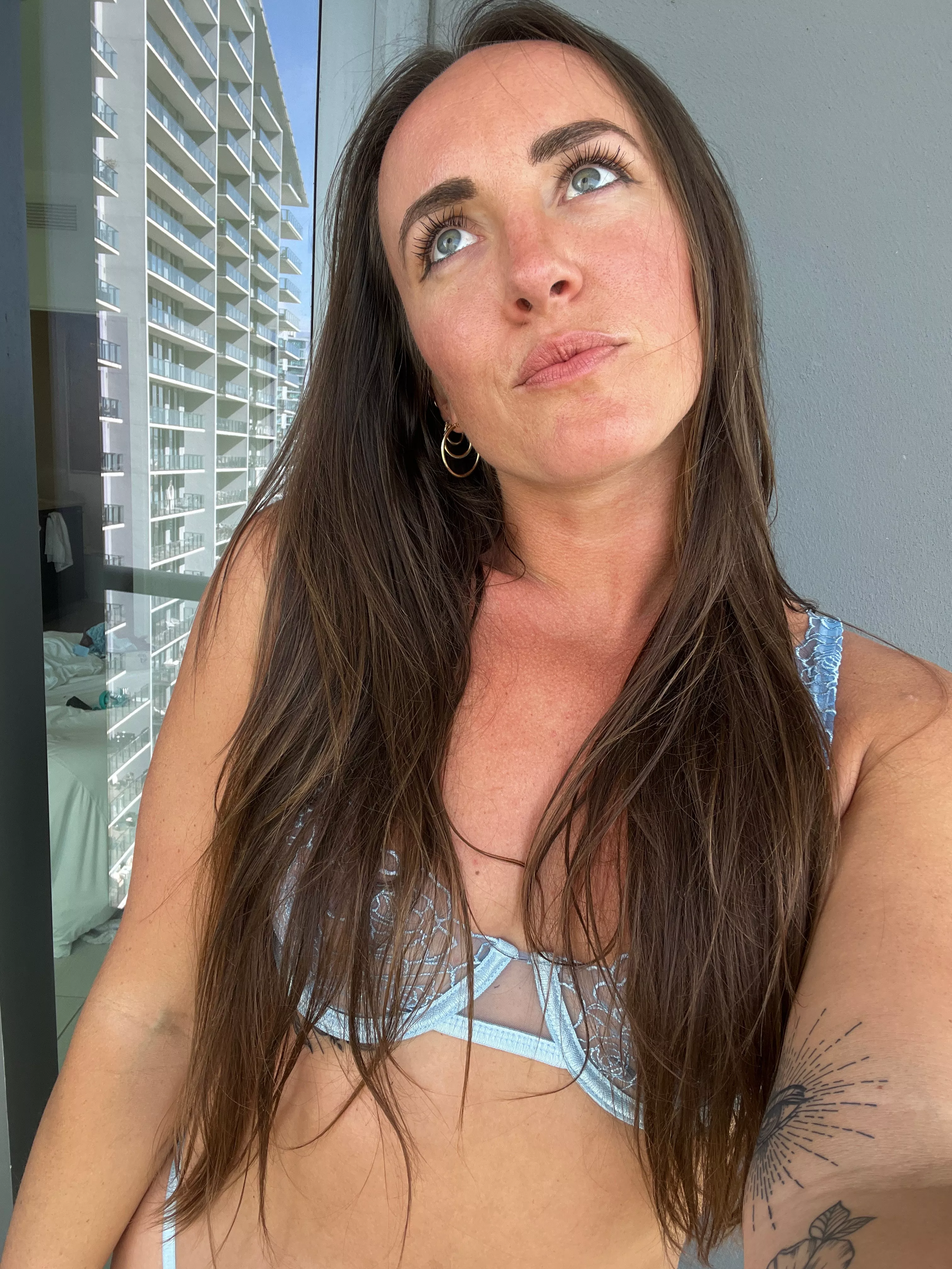 on the balcony in lingerie, I wonder what the neighbors think posted by lisaaamiller