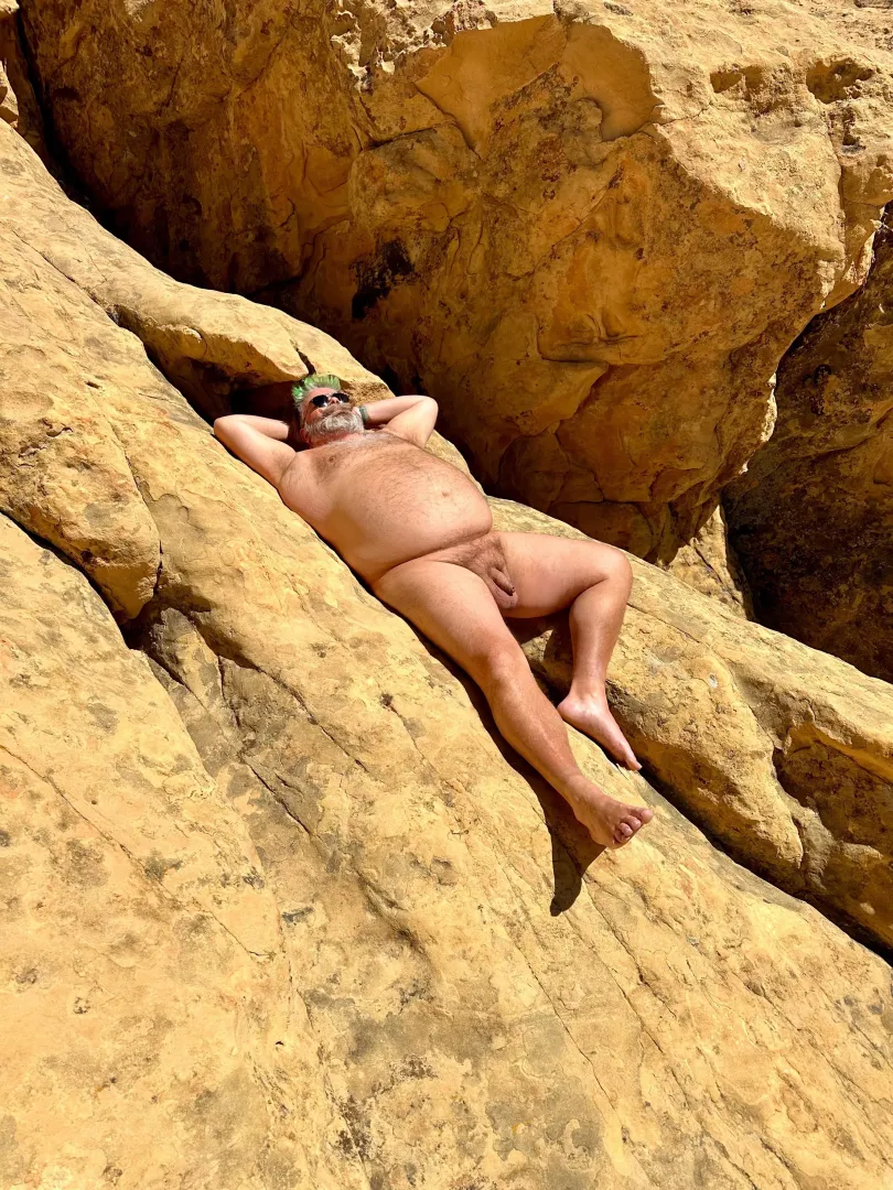 Is there anything as wonderful as the feel of hot rocks under your naked body as you take a nap in the sun? 😋🌞 posted by naturebeardaddy