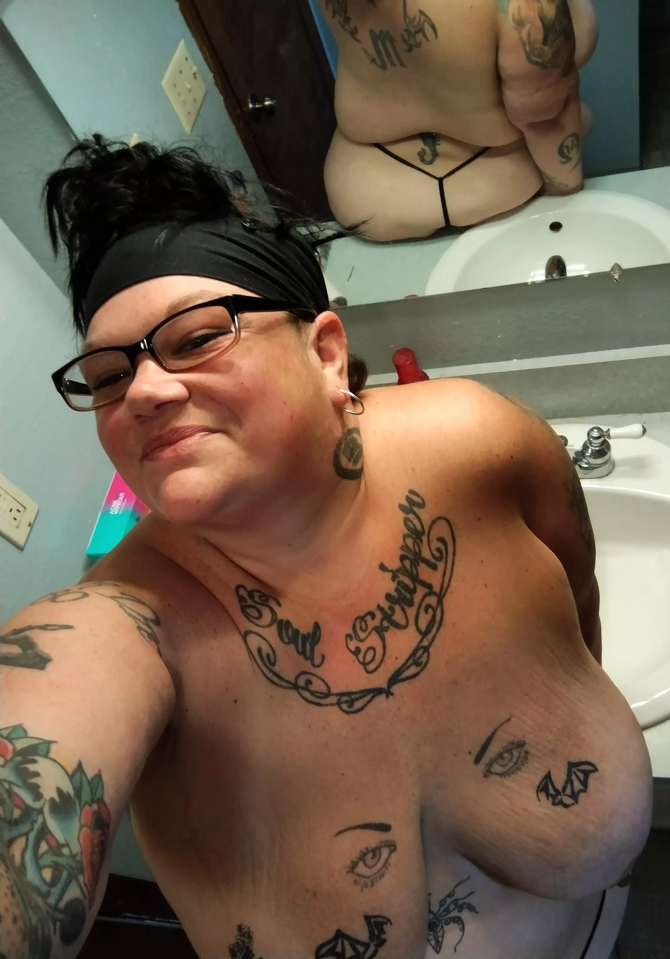 Checking my reflection while I change for my workout posted by Soul_Stripper_