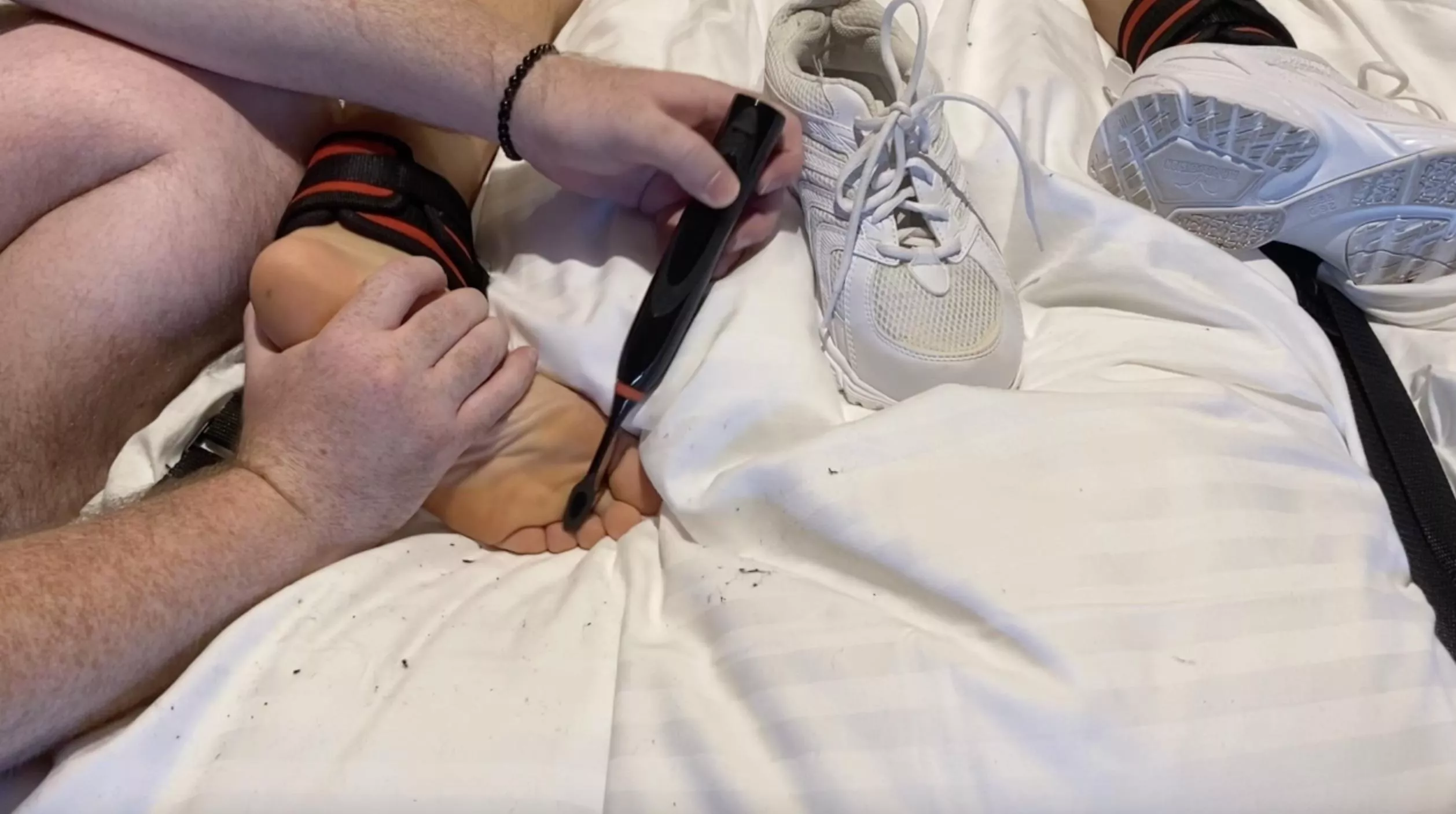 I had to stuff his sock in his mouth as a gag cause he was making so many noises 😅 posted by tticklerr