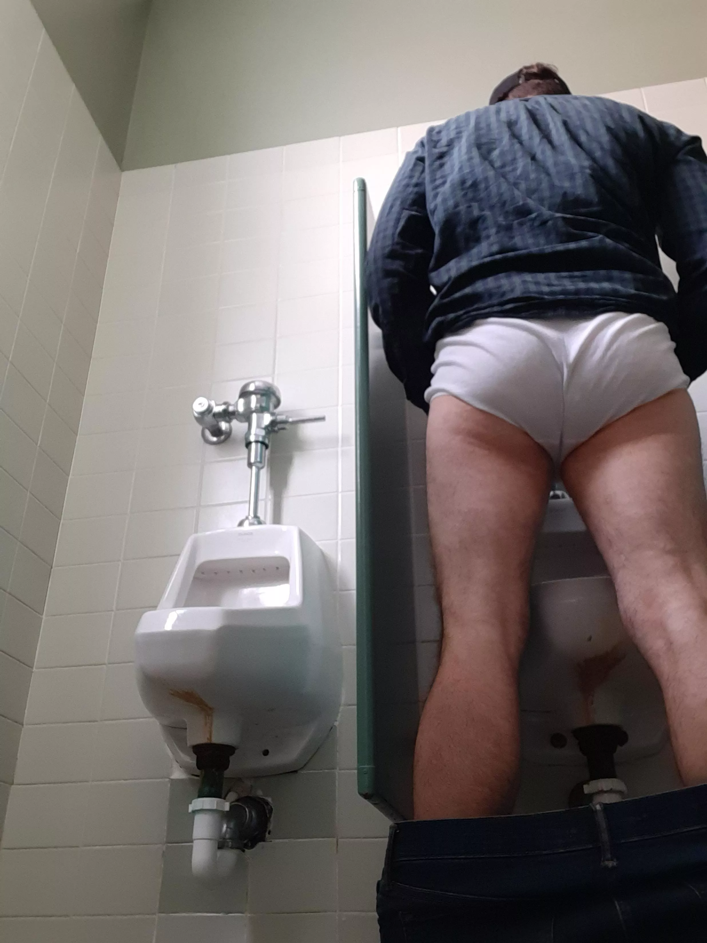 I always thought the hardest part of using a urinal was aiming, but apparently, keeping your pants up is also a challenge! 🚽👖👇🩲😳😆 posted by brief_moments