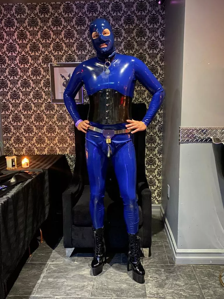 Latex catsuit, corset and hood. Locked in my chastity belt over the latex! Enjoy! posted by burlboy13