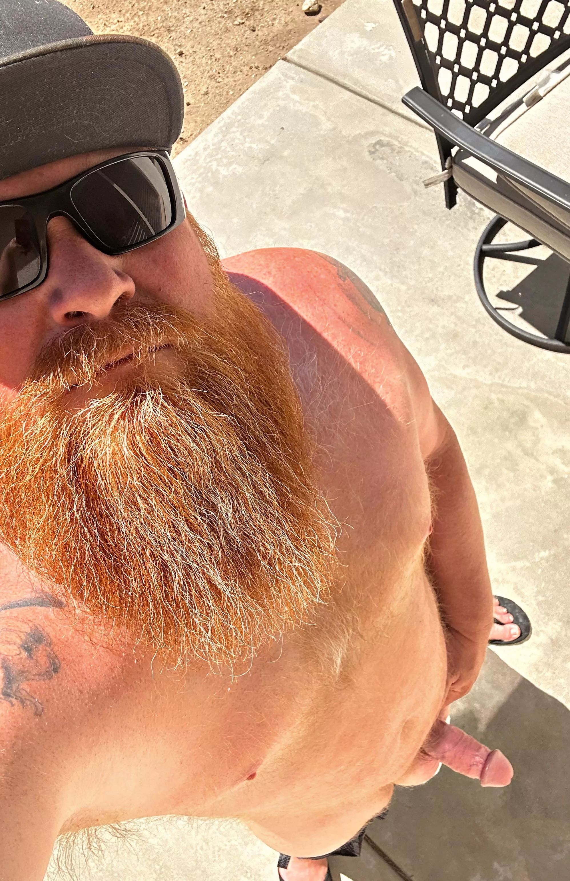 Getting some sun on my beard posted by beardedheathen69