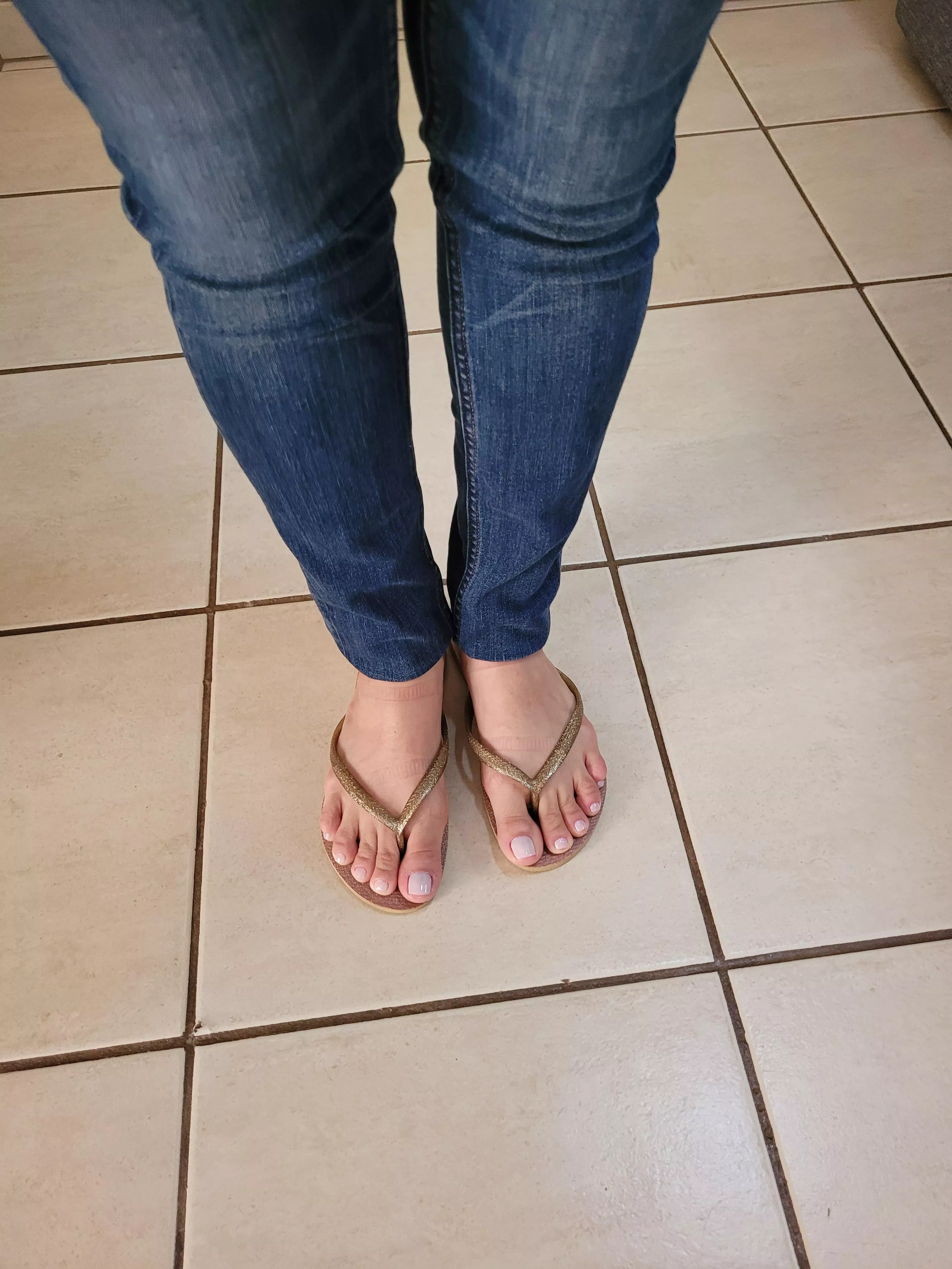 Jeans ans flip flops... Where am I going? posted by feetandsurprises