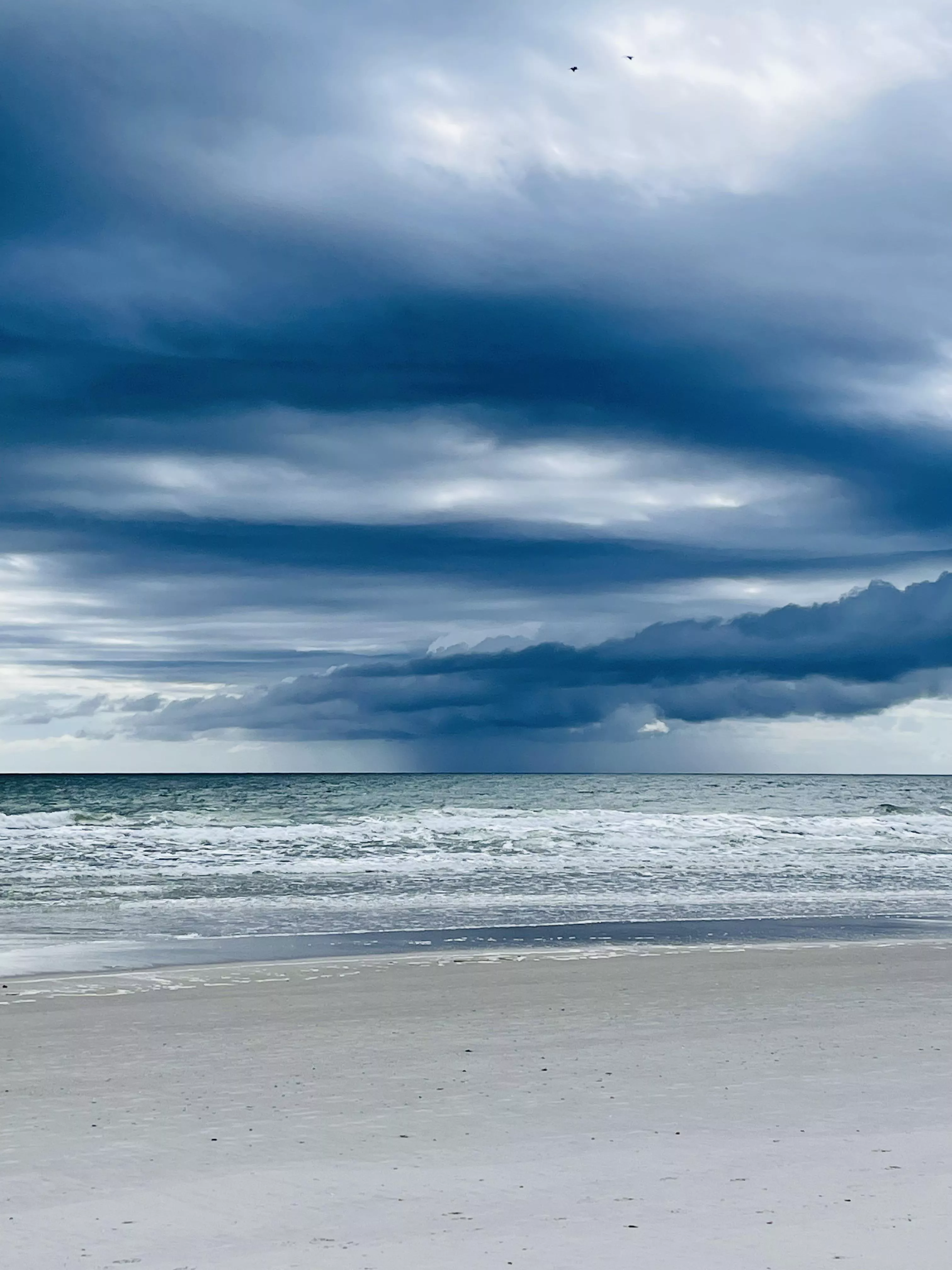 Rain off in the distance posted by VagariTurtle