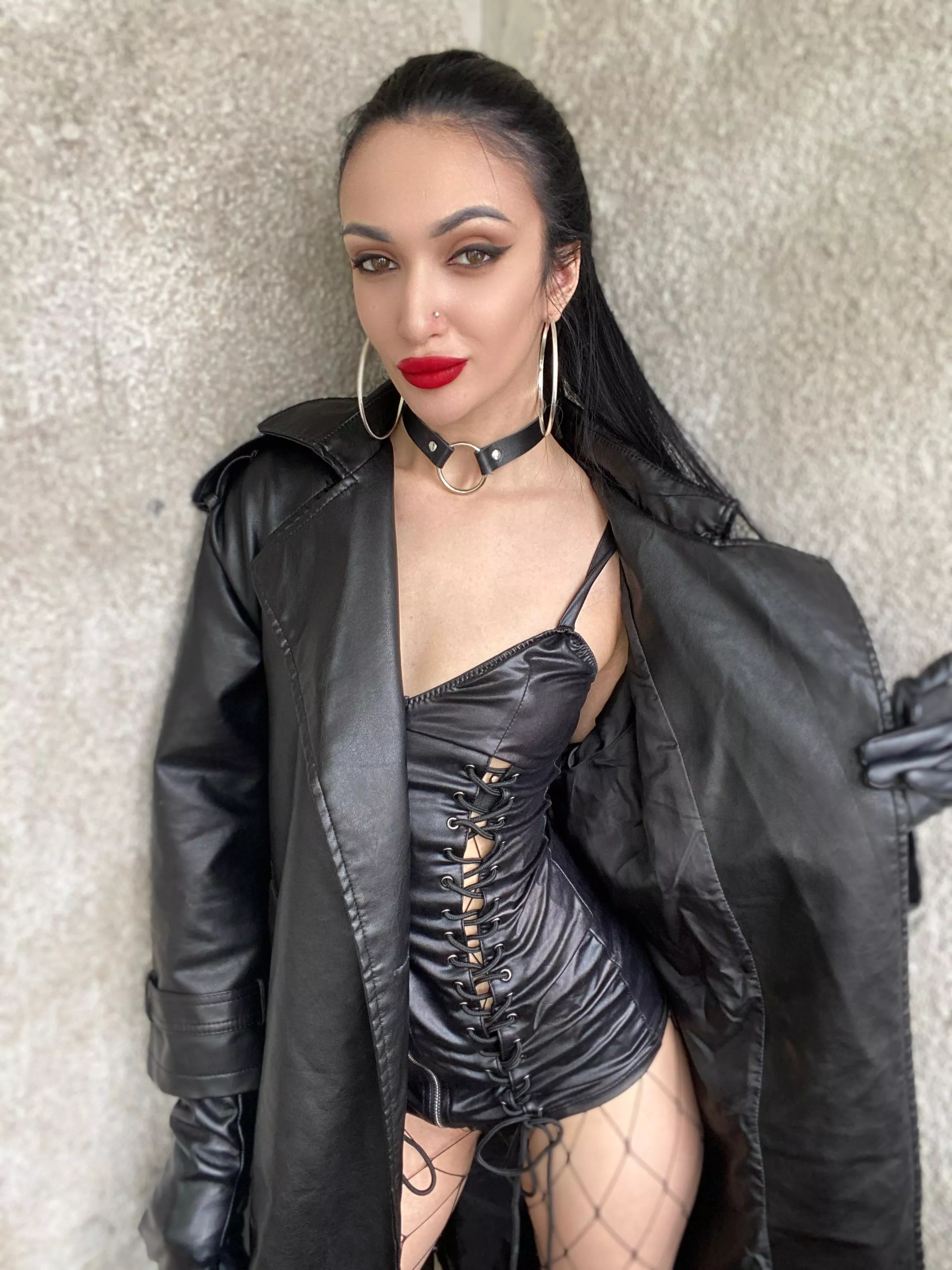 Brunette in leather and red lips posted by katrin-cherry56