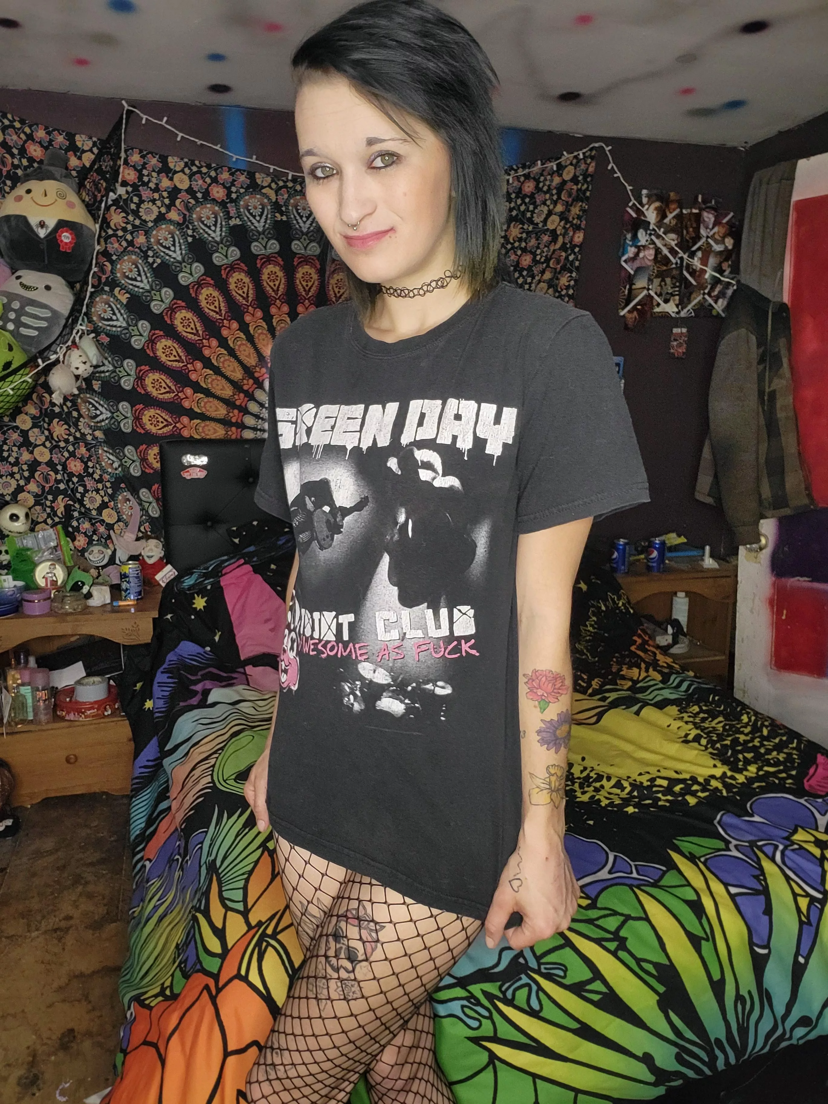 A cozy band tee and some fishnets is all I need🤍 posted by Zeemako420