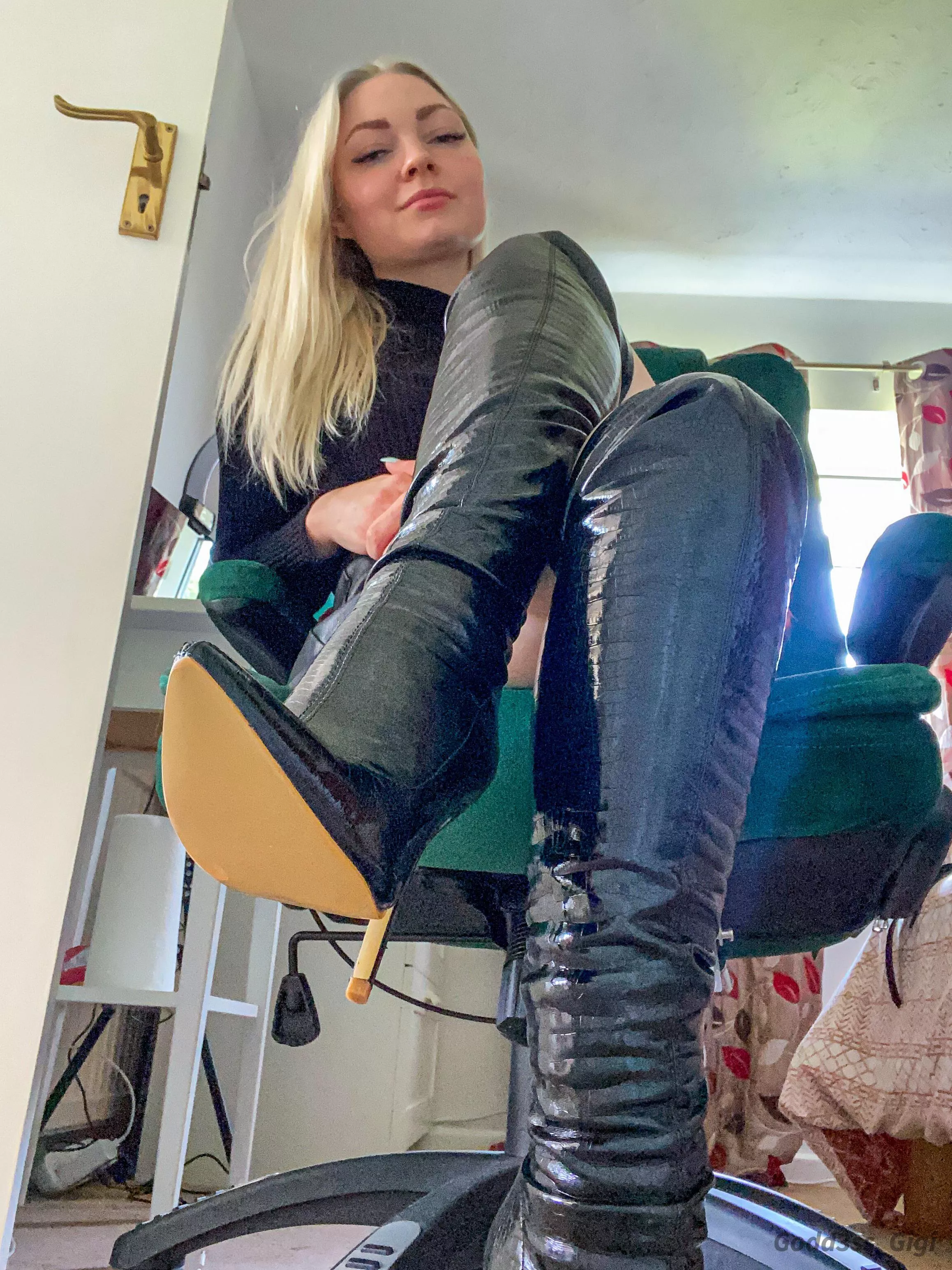 You can’t resist a shiny knee high PVC boot posted by yourpetitegoddess