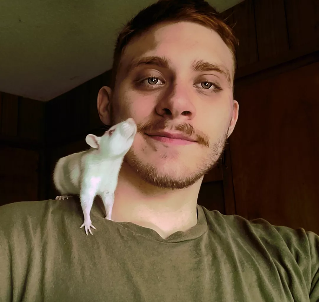 Just a boy and his rat posted by Background_Square978