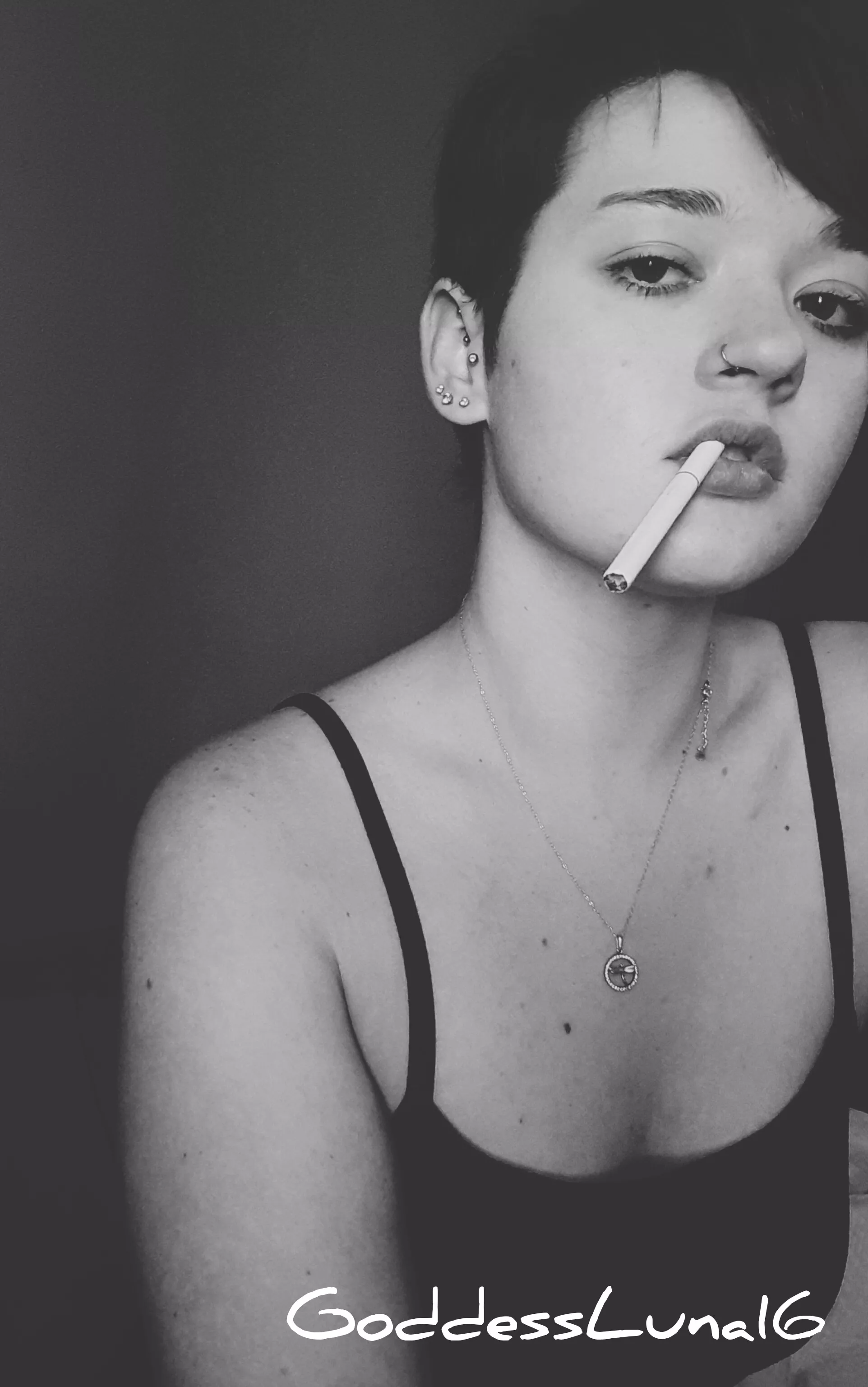 Got a lighter? 😉 P.S. I love my resting bitch face 🤭😌 posted by GoddessLuna16