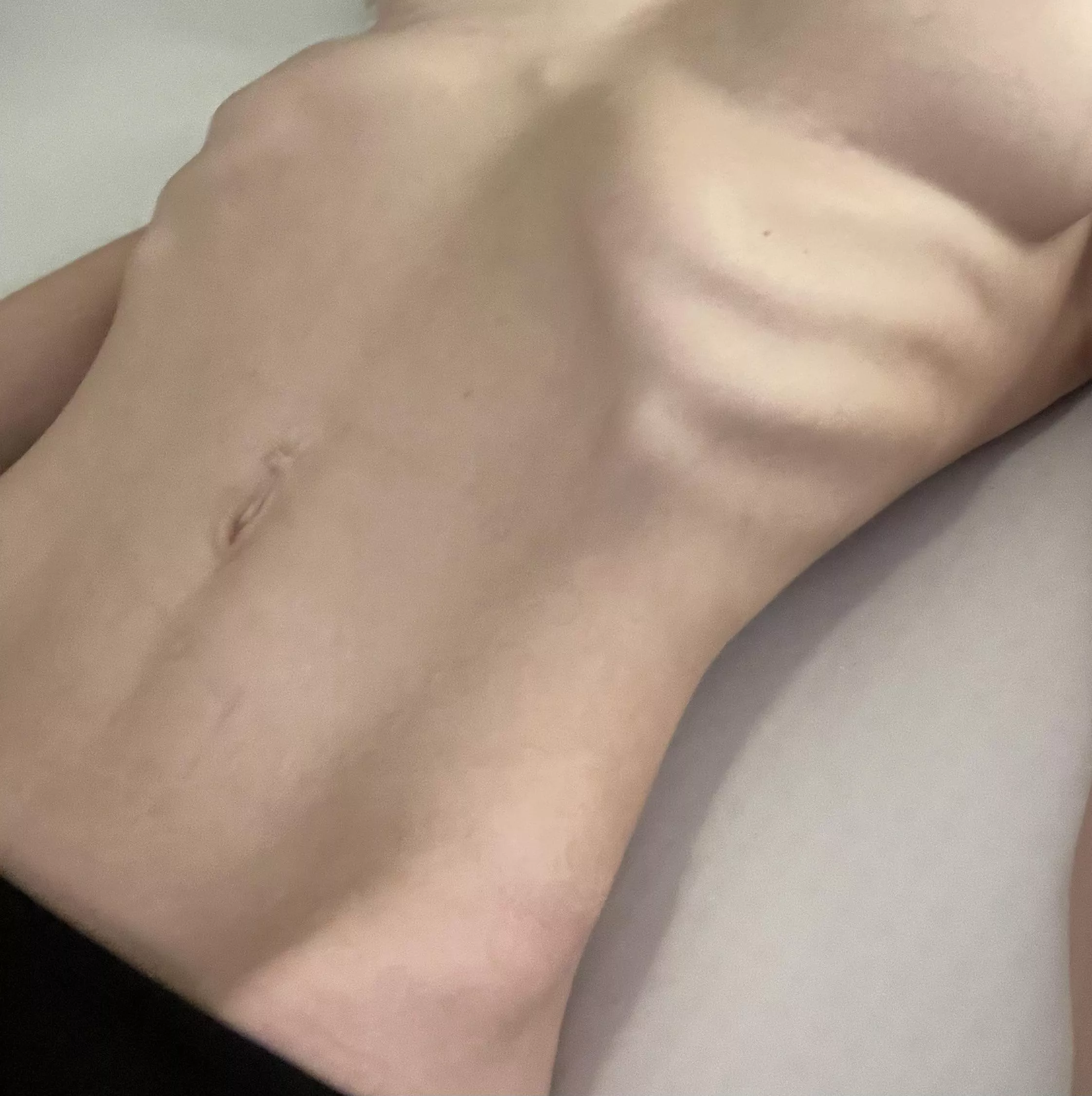 Stretching in bed posted by kinkfantasies