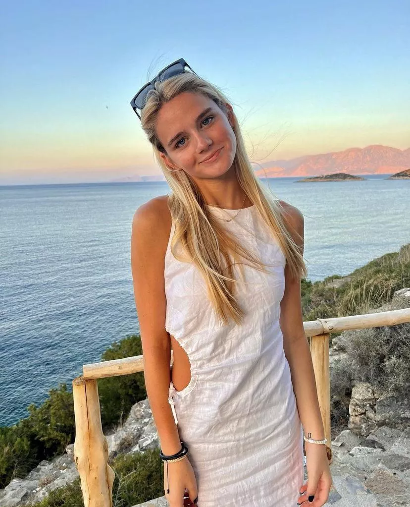 Pretty girl on vacation posted by Weakness-Valuable