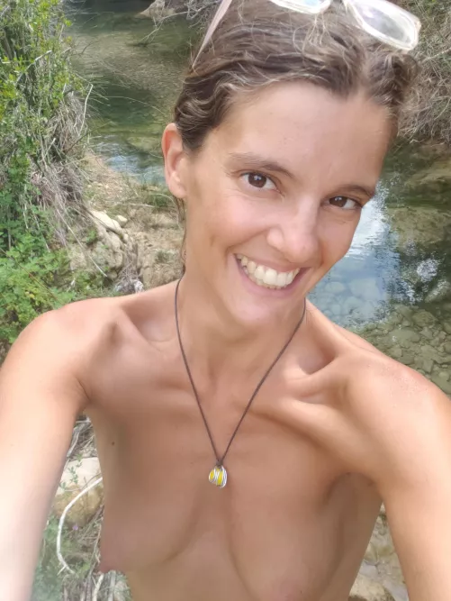 Enjoying the river. Describe this pic in 3 words. Mine : joy, boobs, river by Ardillita_InTheSun