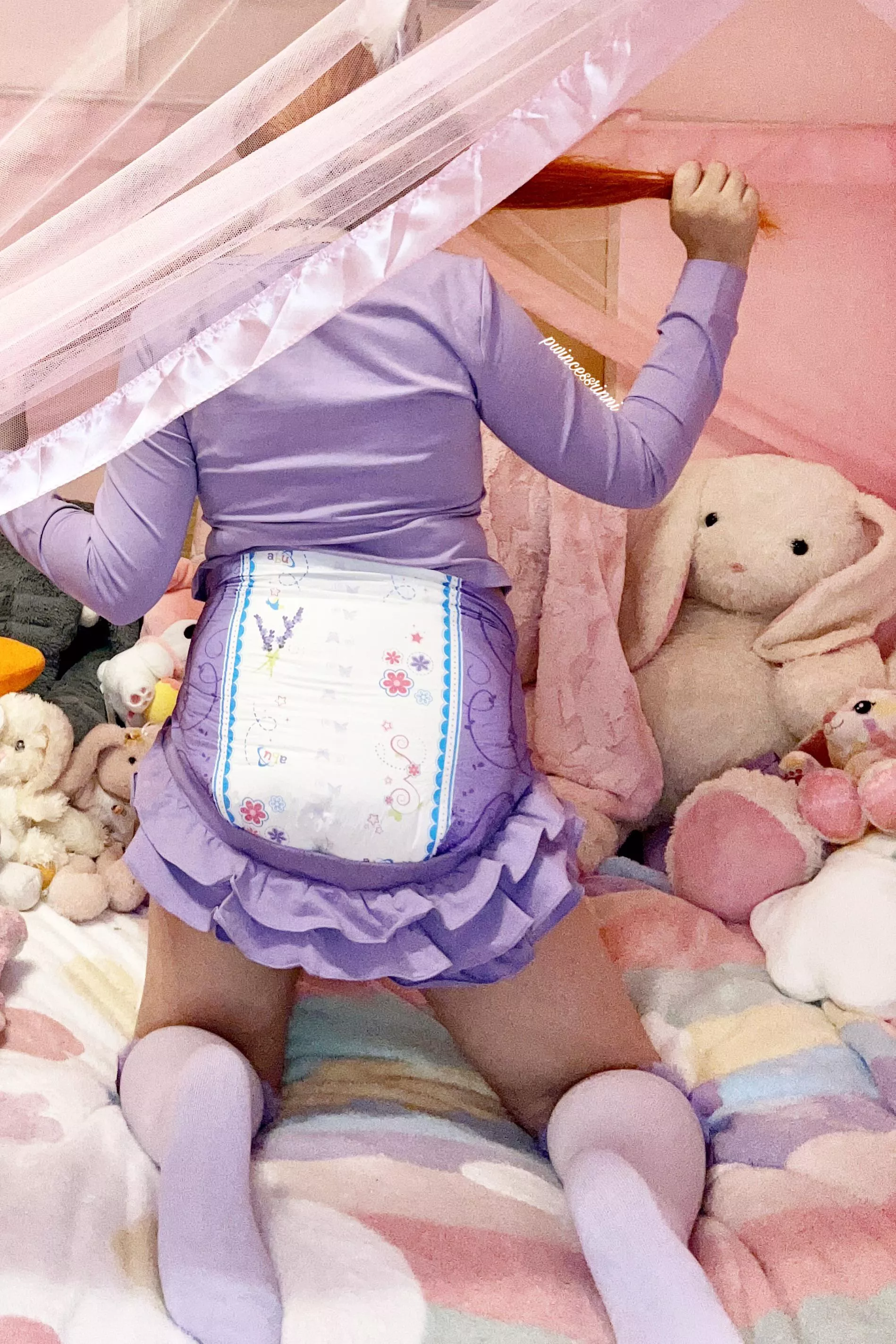 just a little enjoying her diapers and playtime 💜 posted by pwincessrinni