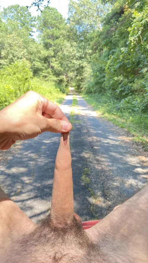 In the street playing with my foreskin. by _OneBraveToaster_